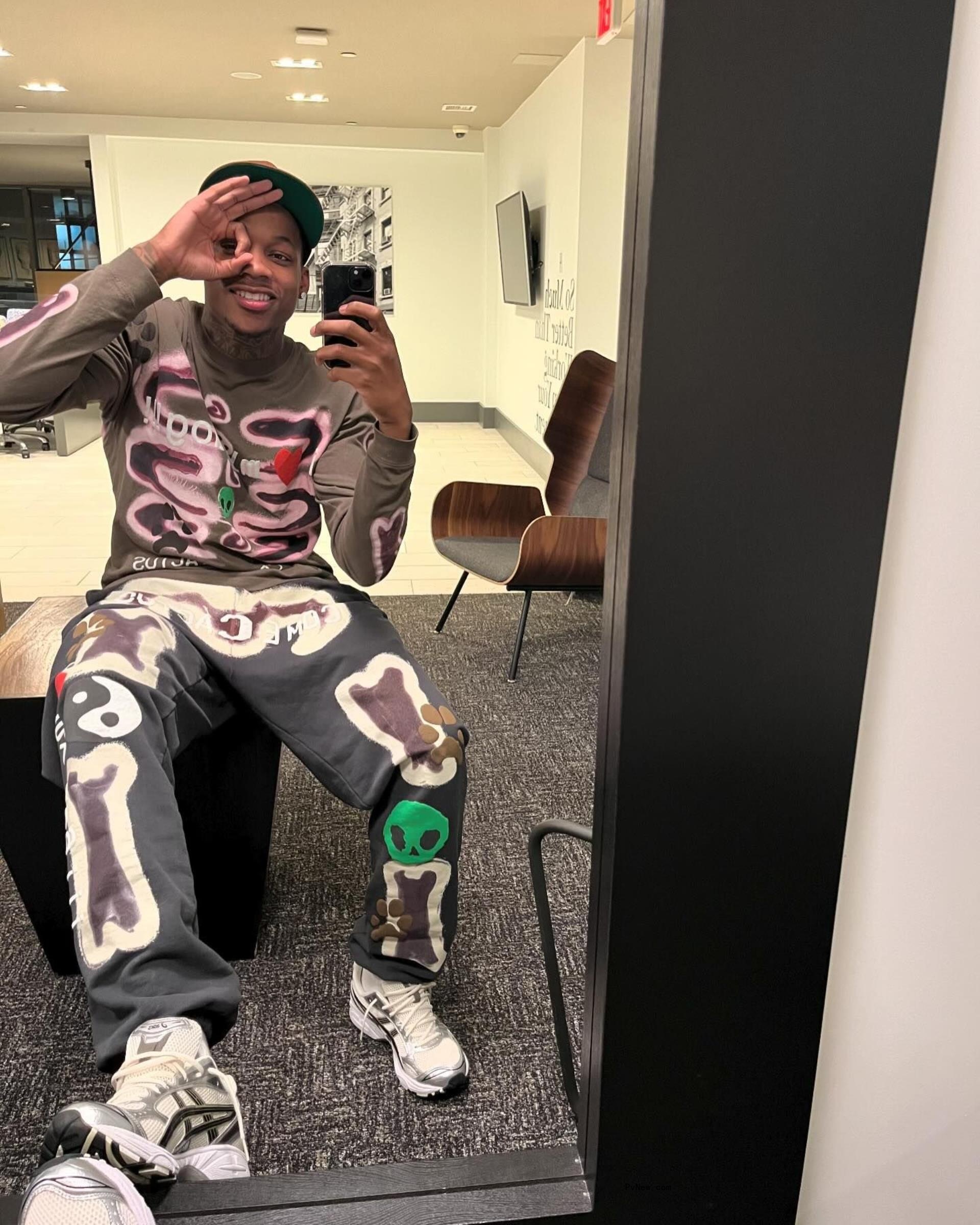 A mirror selfie of Tylil James.