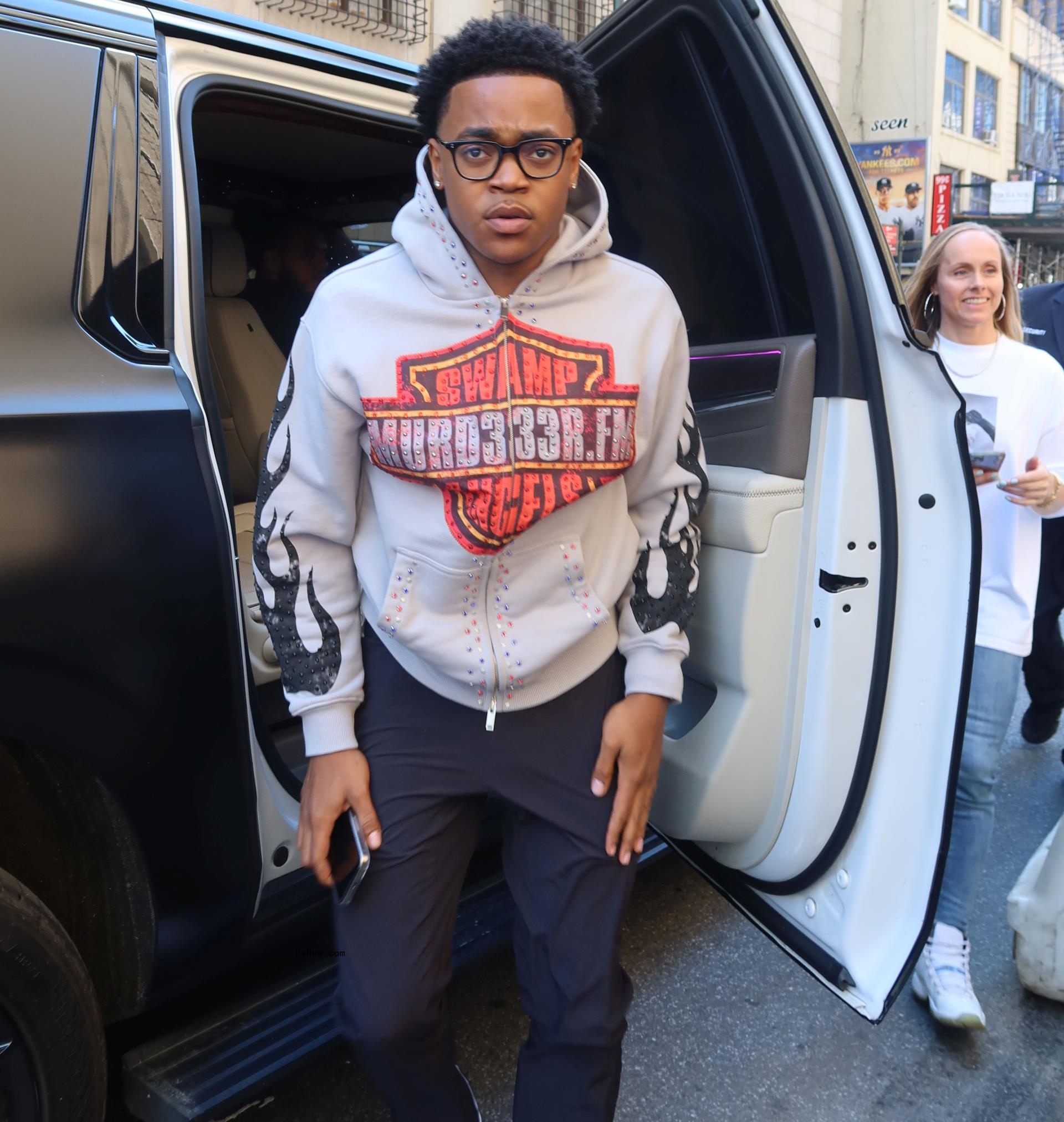 Michael Rainey Jr. getting out of a car.