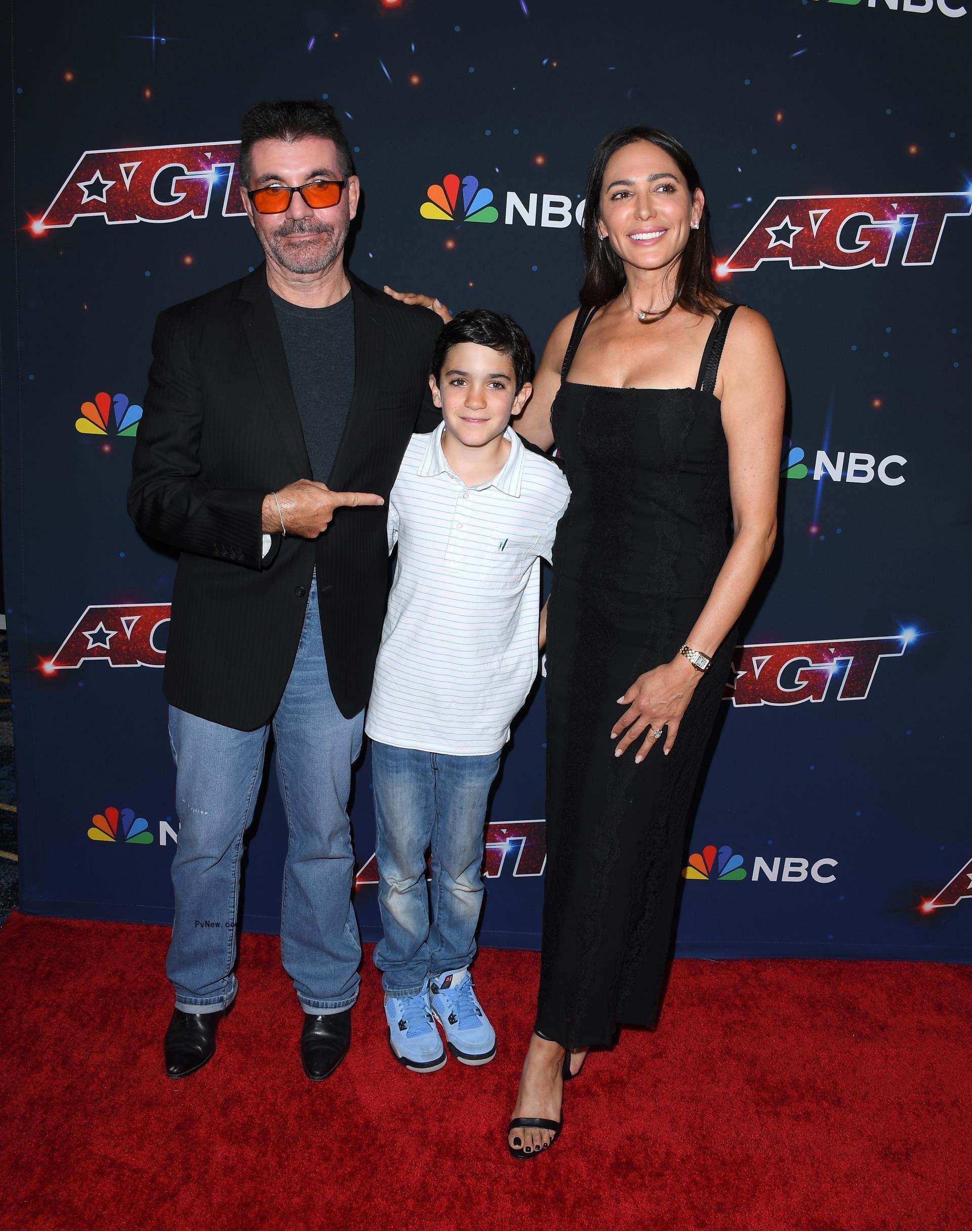 Simon Cowell, Lauren Silverman and their baby.
