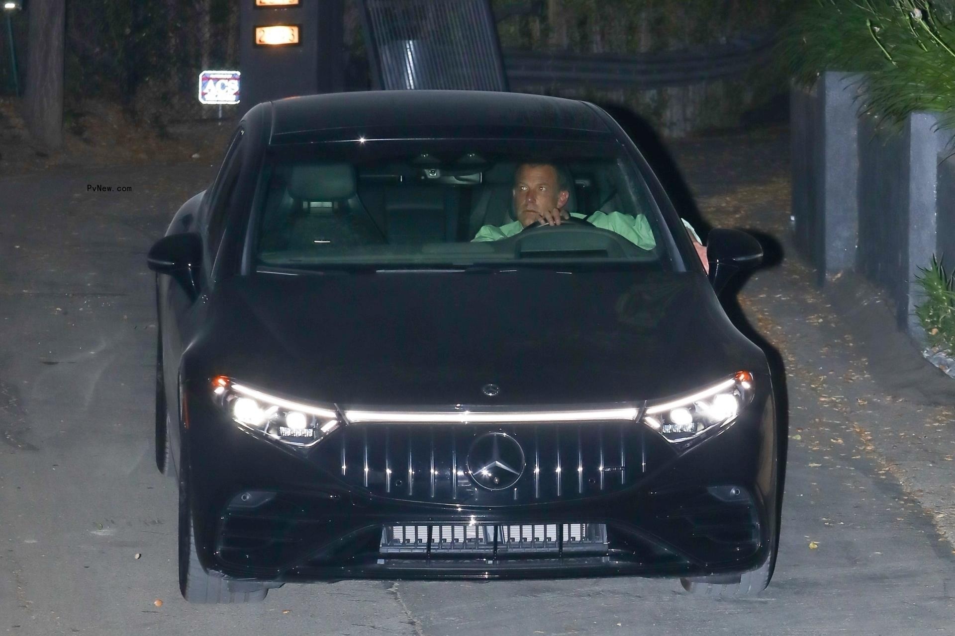 Ben Affleck leaving his and Jennifer Lopez's marital home.