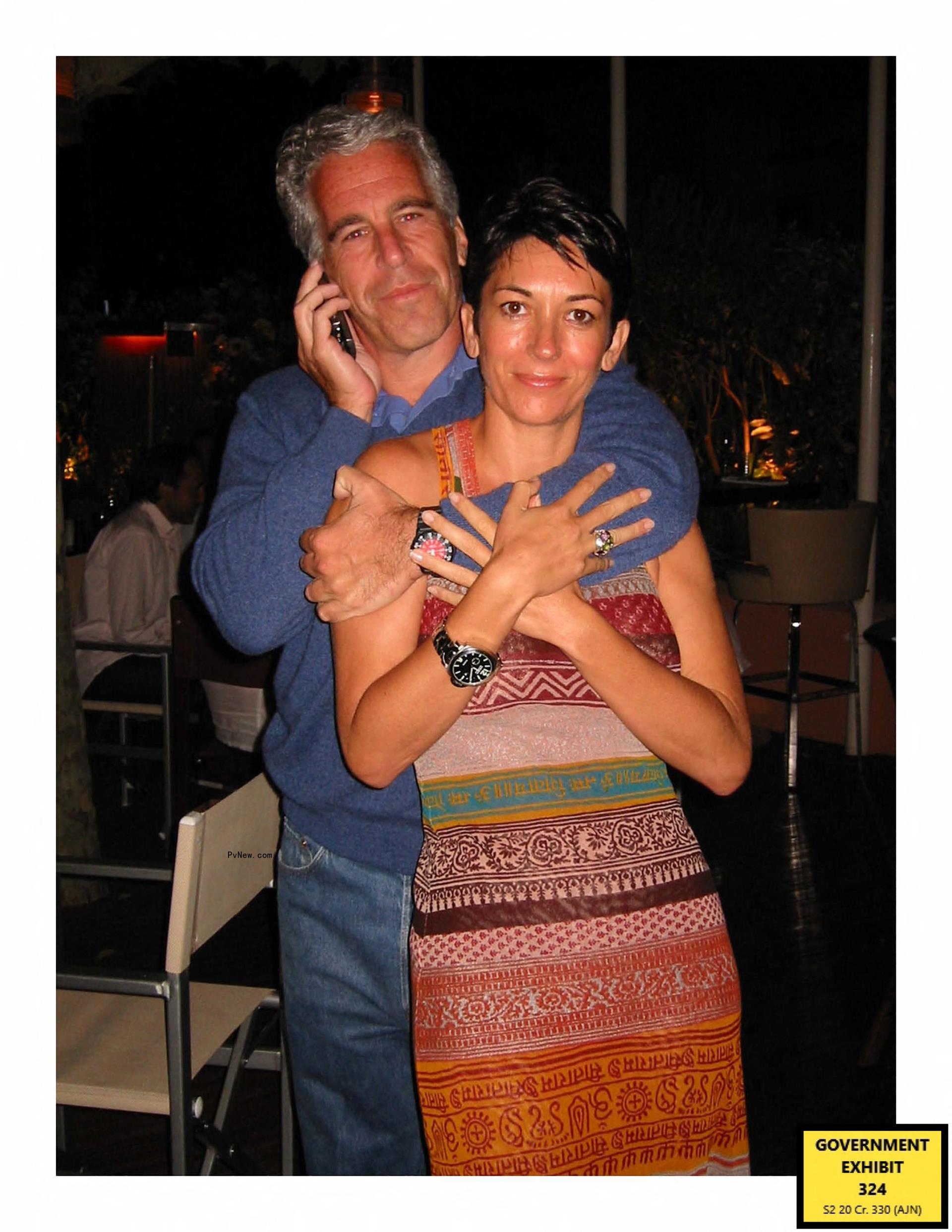 Jeffrey Epstein and Ghislaine Maxwell hugging.