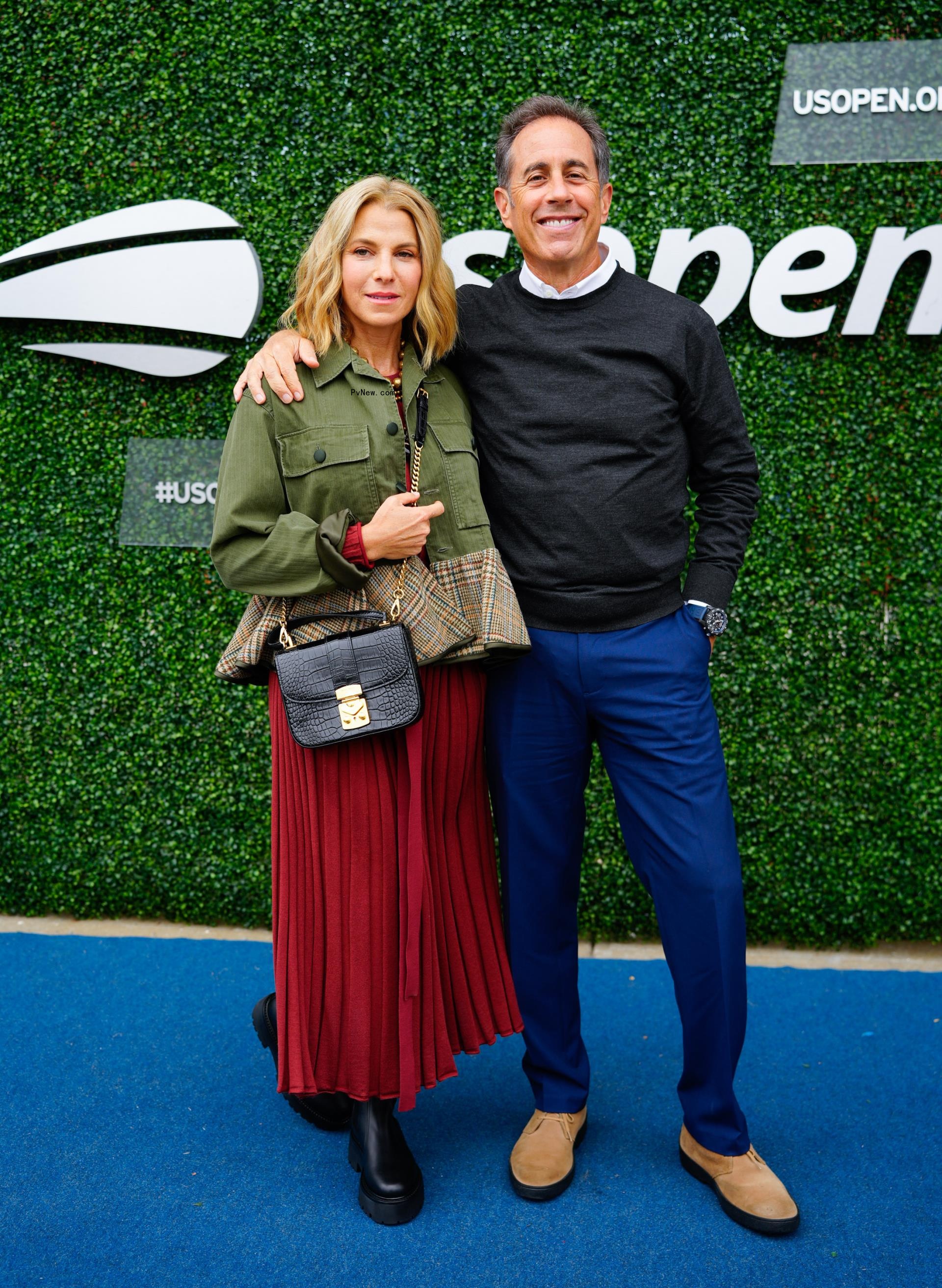 Jerry Seinfeld and Jessica Seinfeld smiling in a photo.
