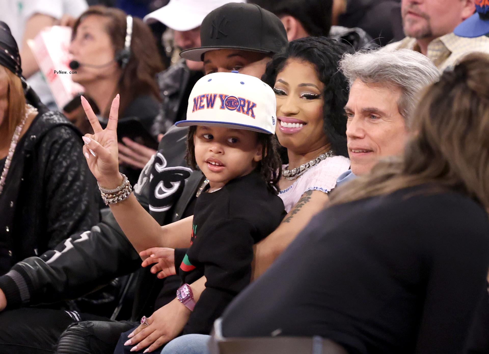 Nicki Minaj and her son at an NBA game.
