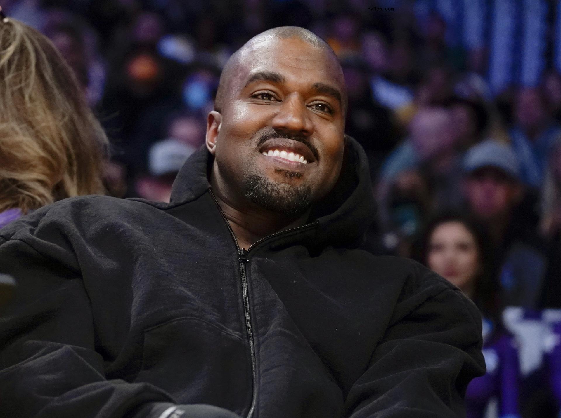 Kanye West smiling.
