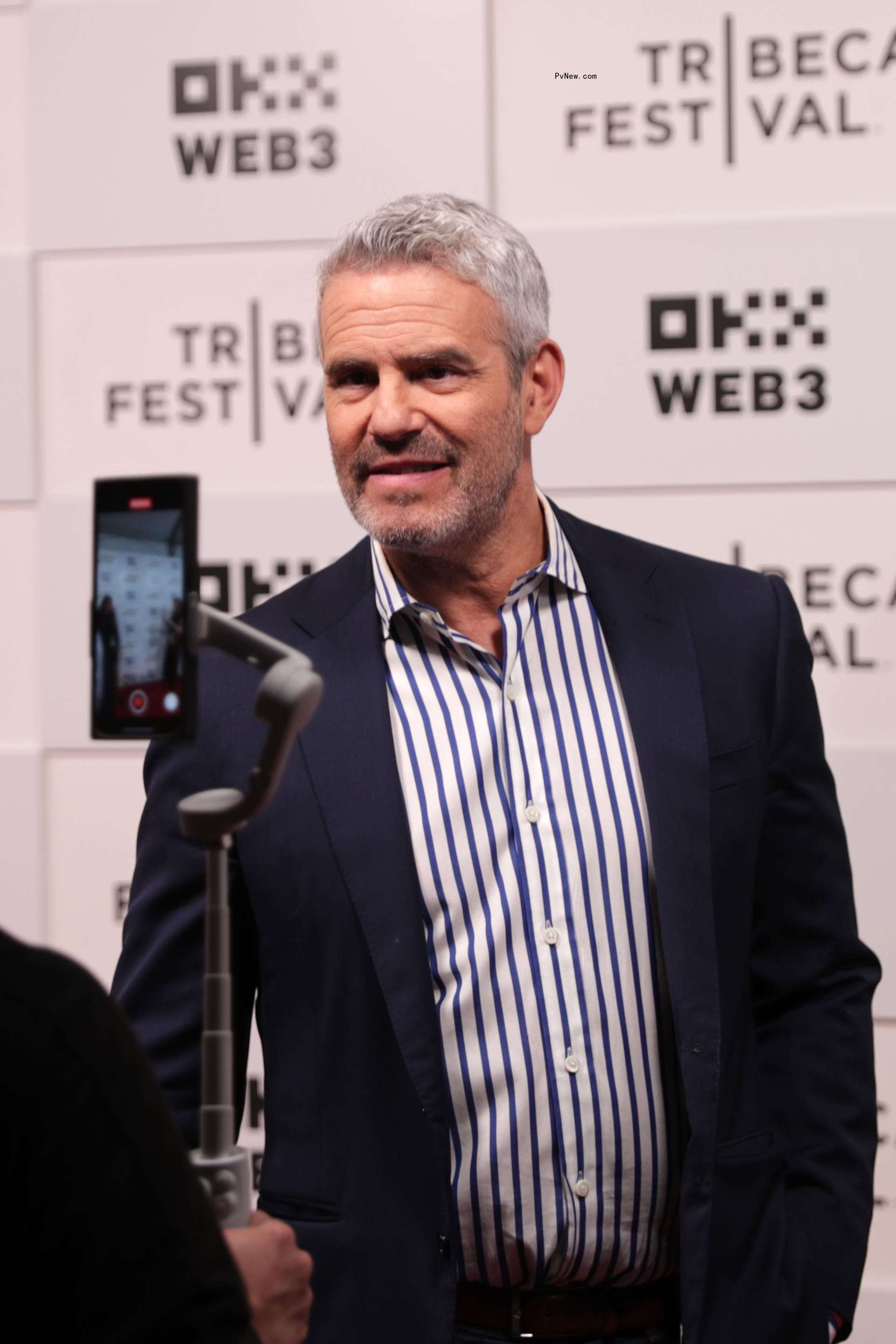 Andy Cohen talking on a red carpet