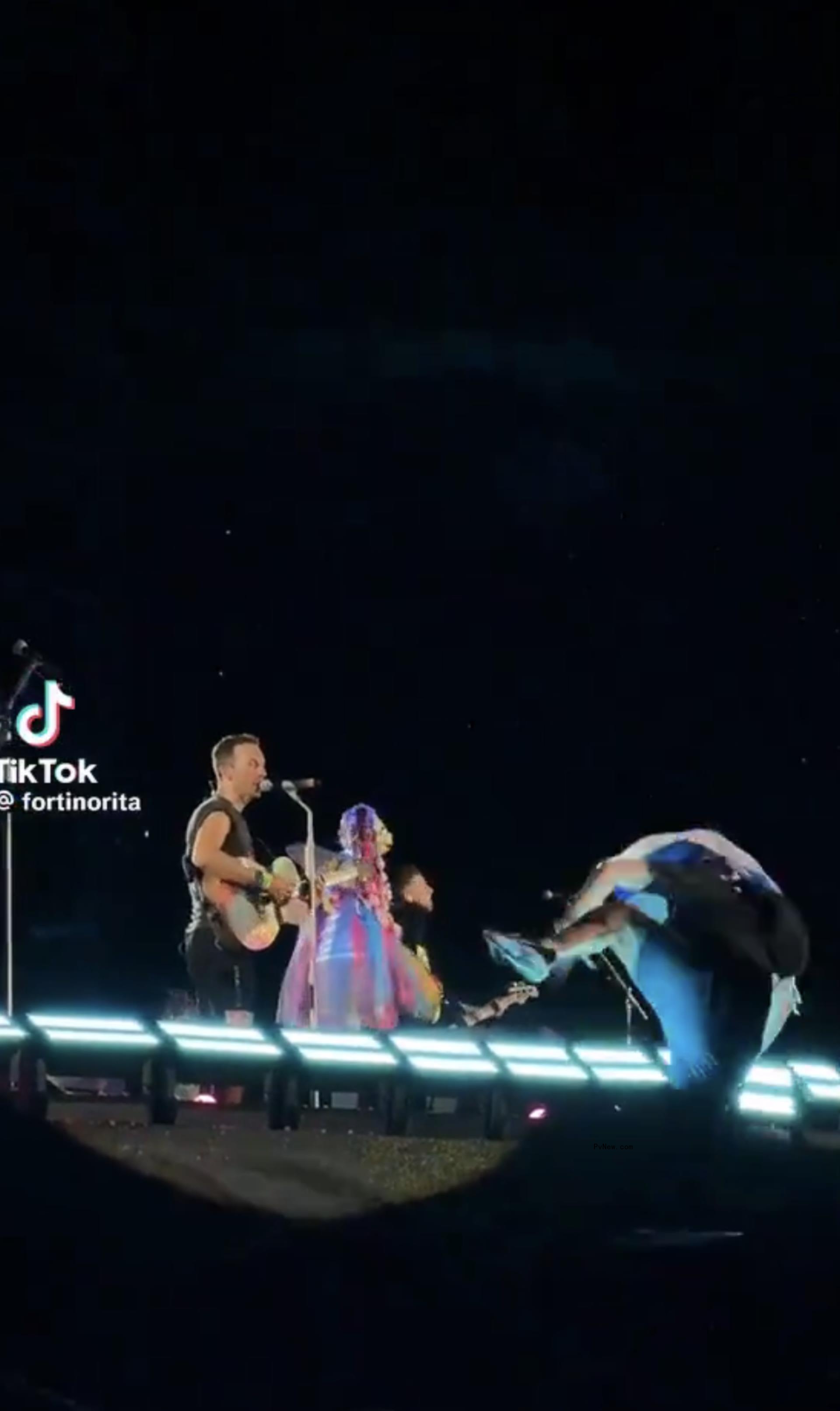 A man interrupting Coldplay's concert.
