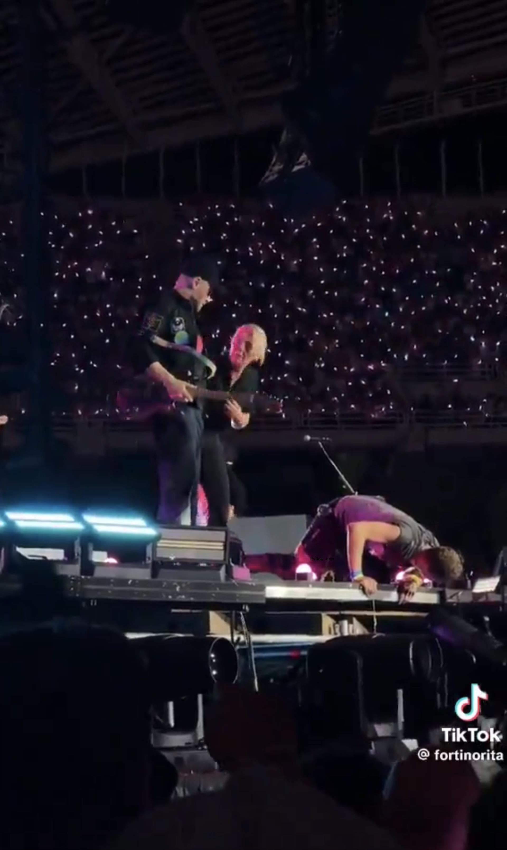 Coldplay onstage.