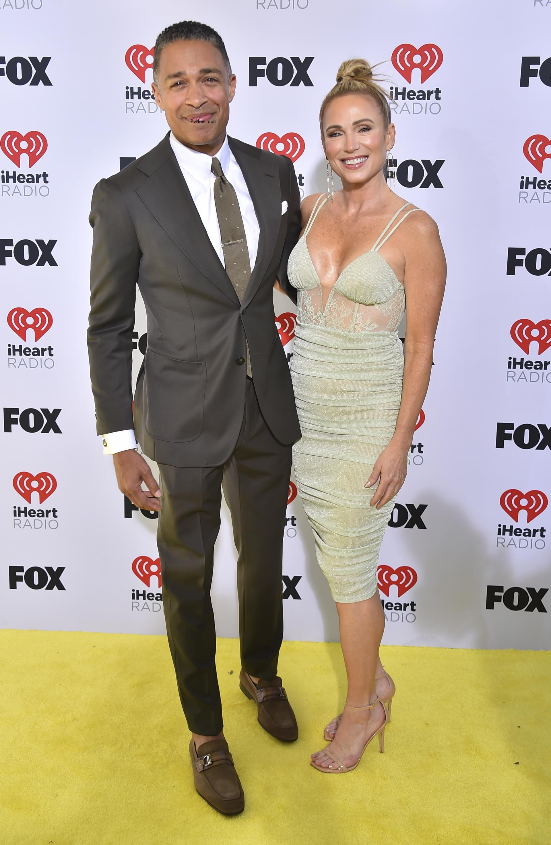T.J. Holmes and Amy Robach.