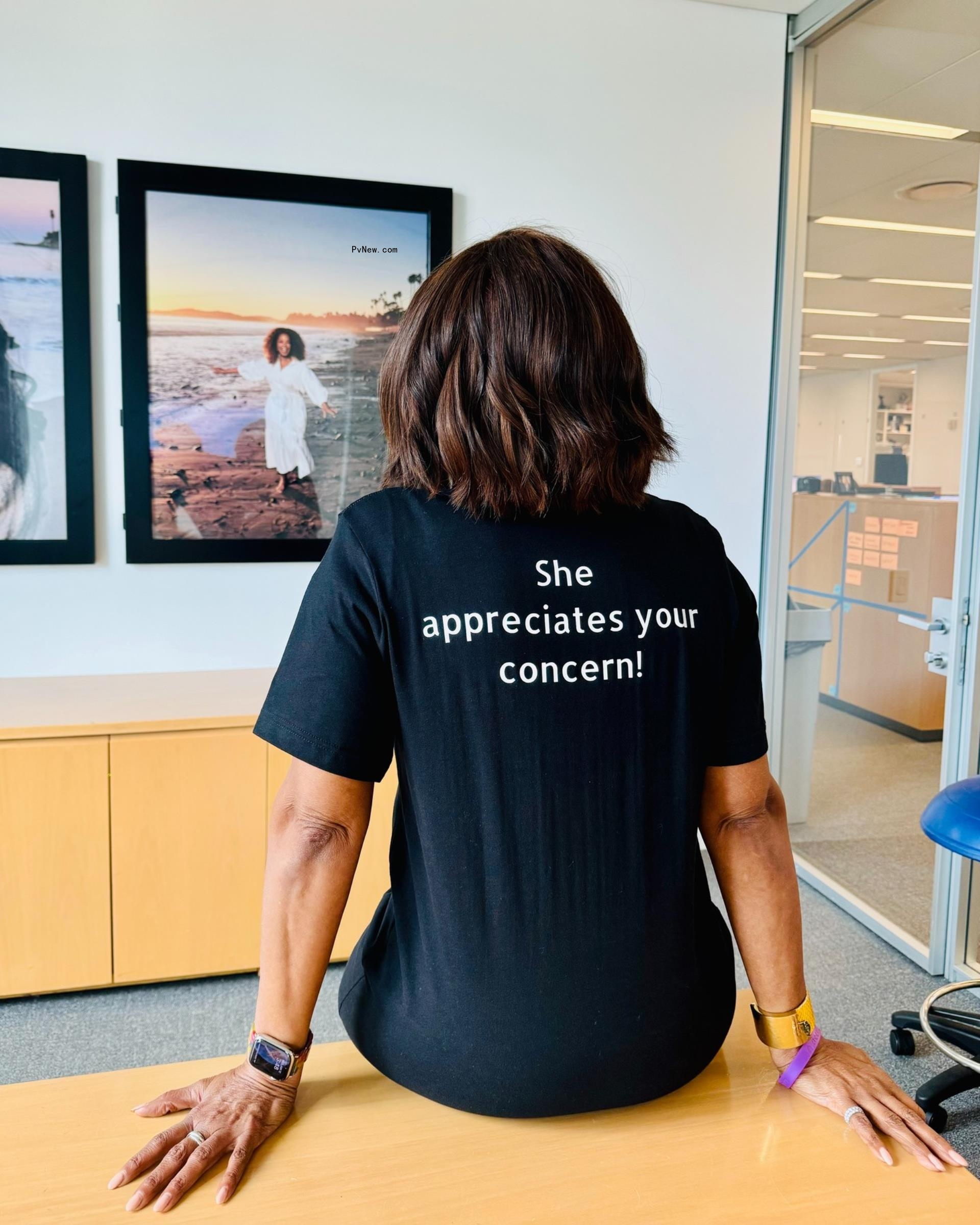 Gayle King wearing a black T-shirt.