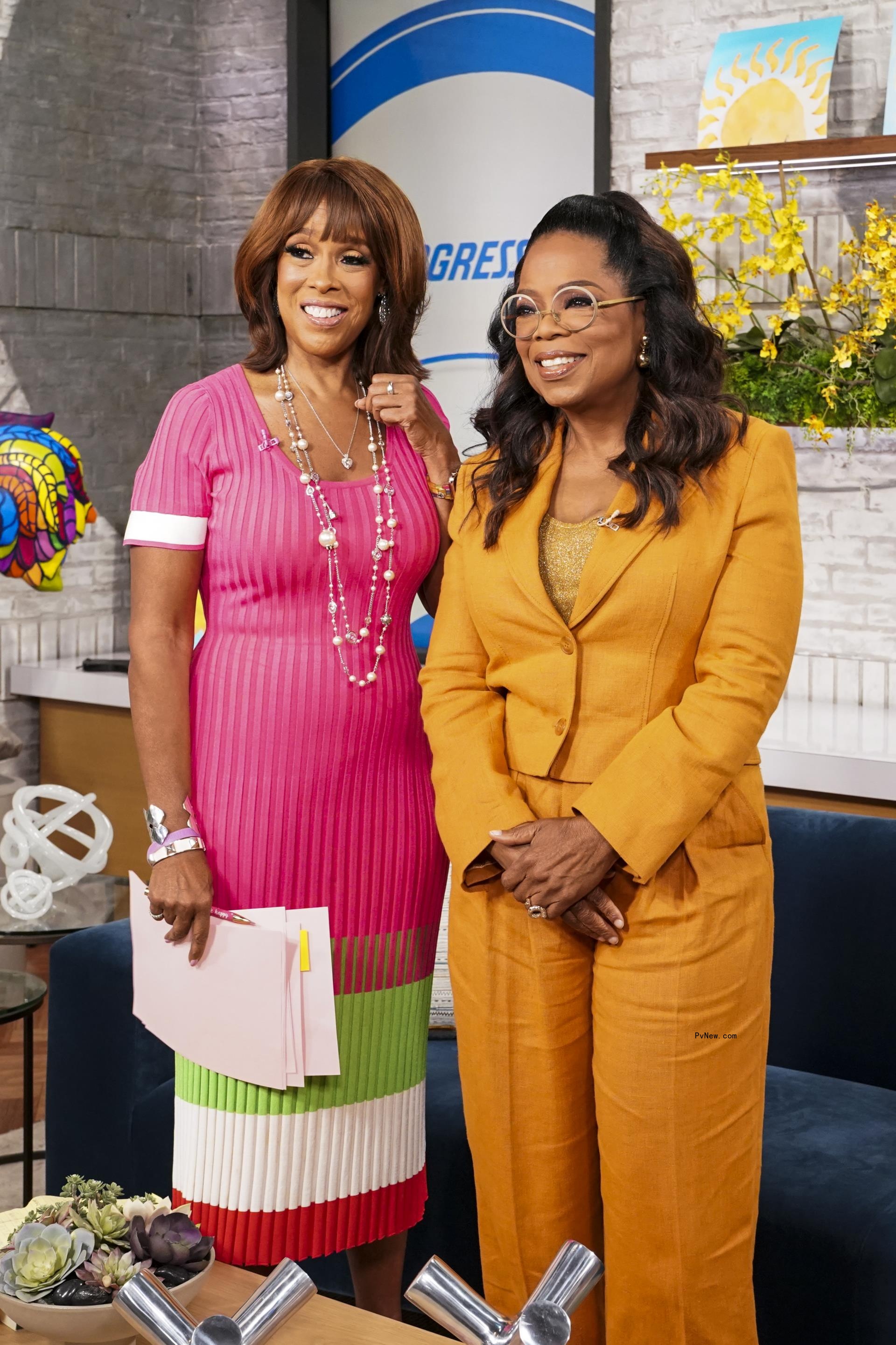 Gayle King wearing a black T-shirt.