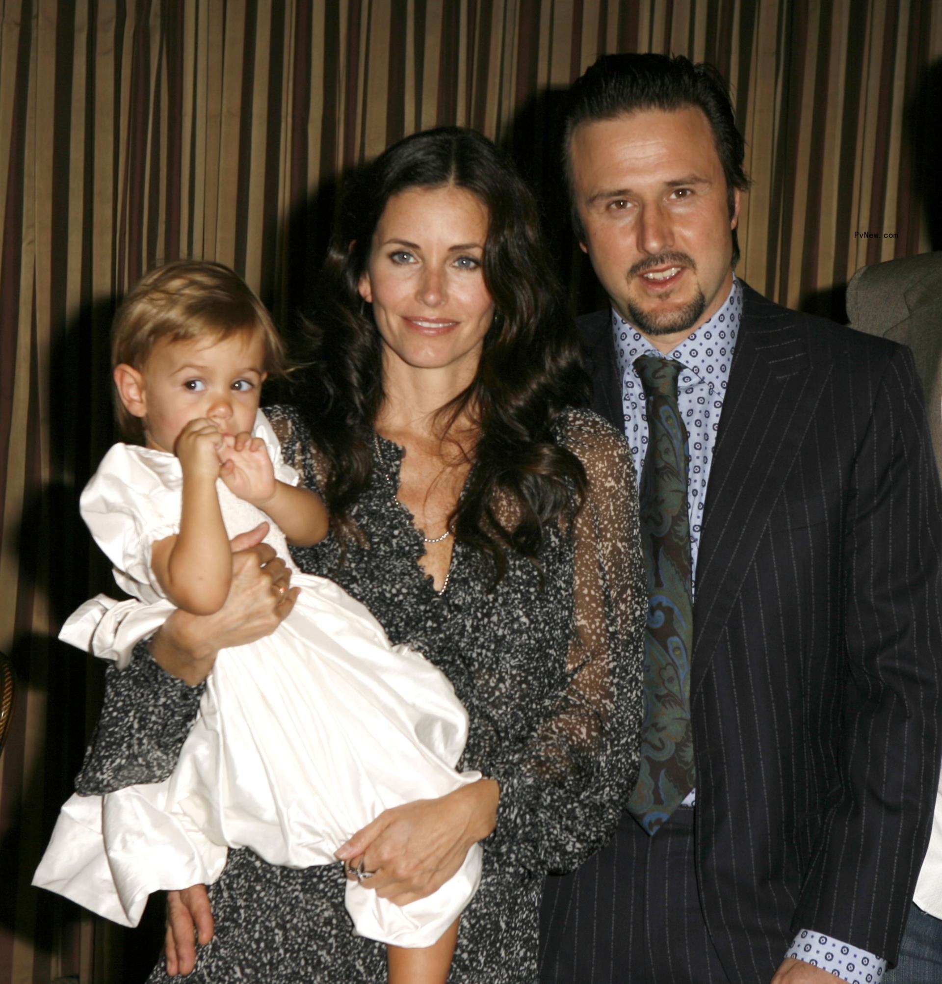 David Arquette and Courteney Cox with Coco as a young child.
