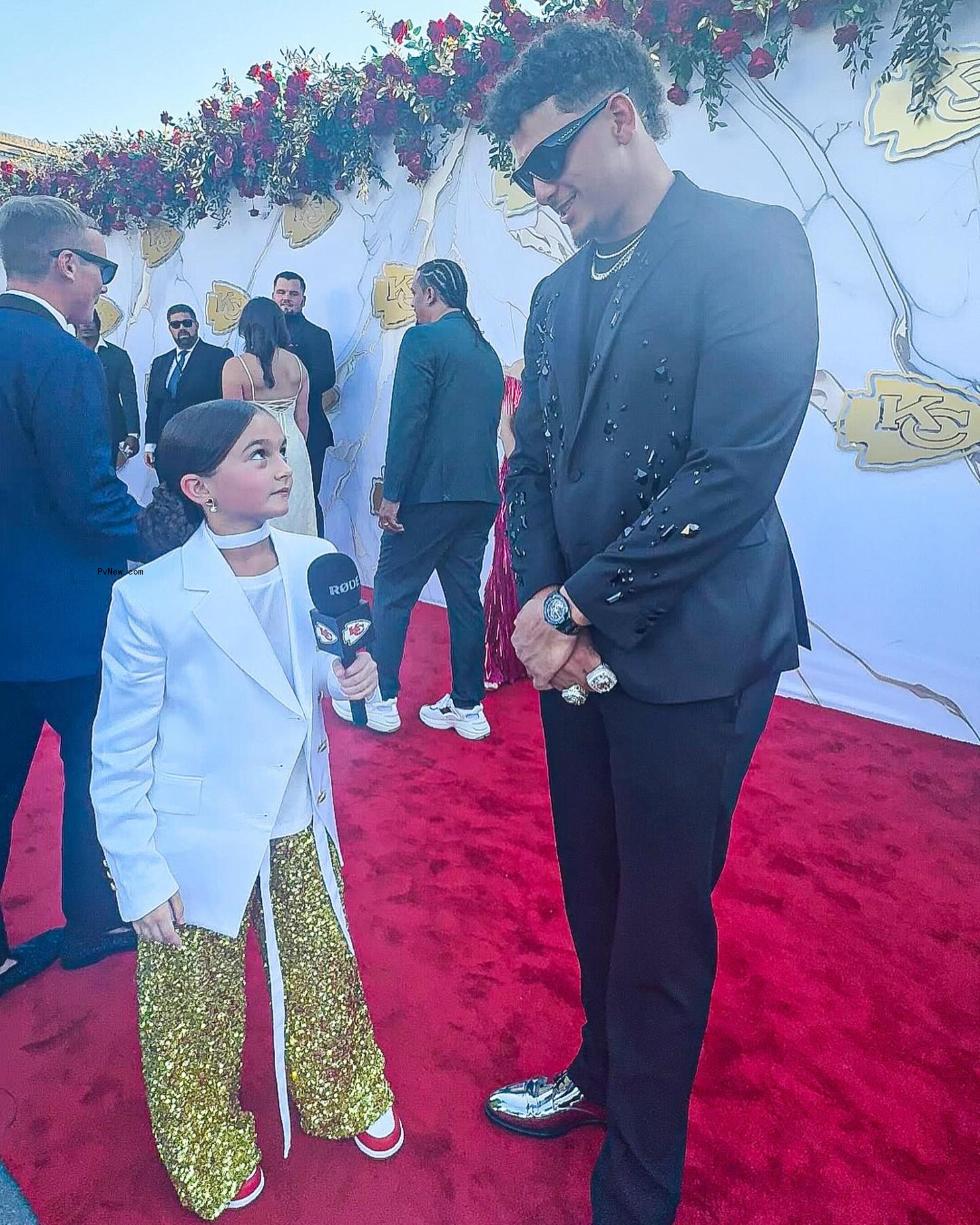Taylen Biggs and Patrick Mahomes