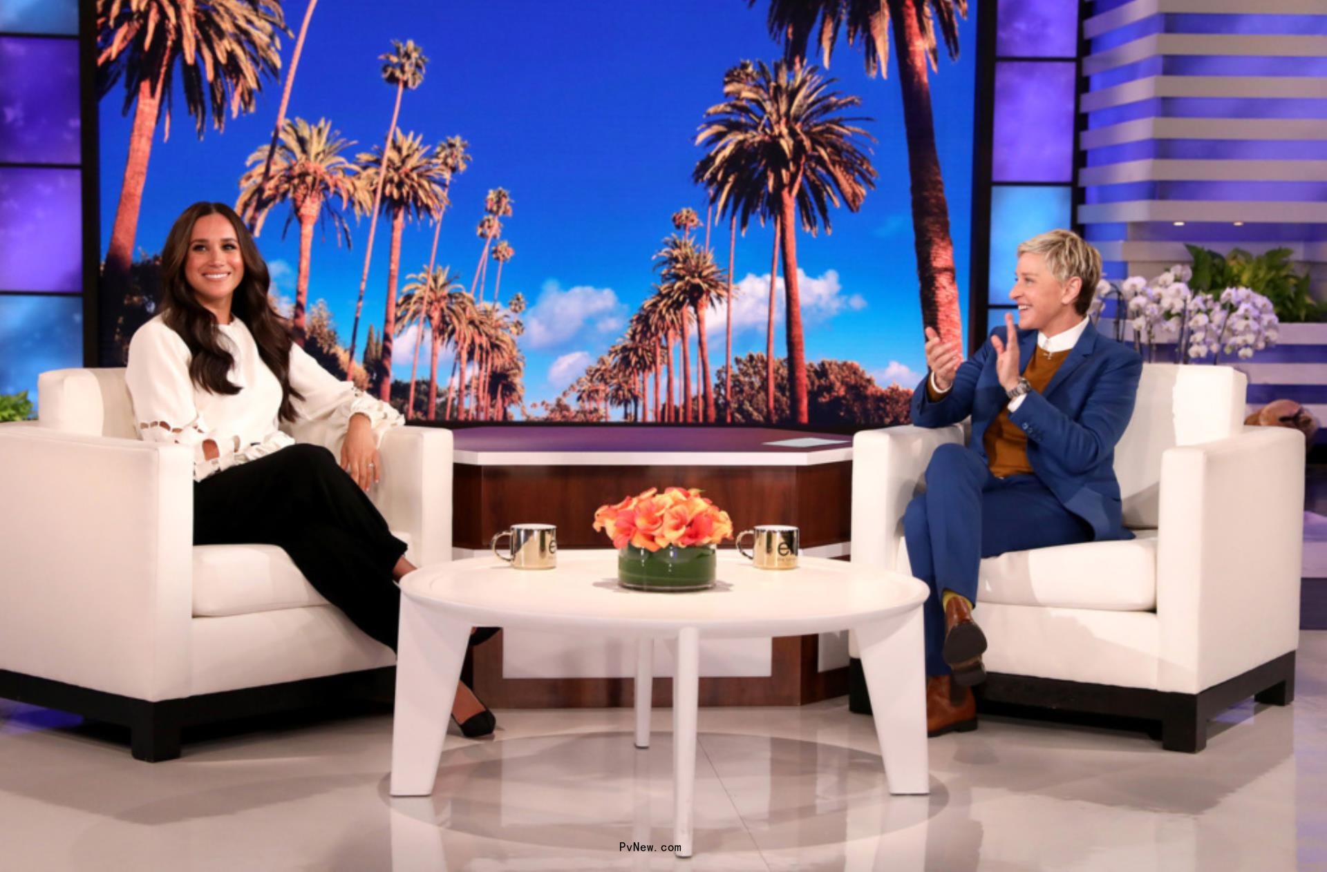 Meghan Markle laughs with Ellen DeGeneres on her show. 