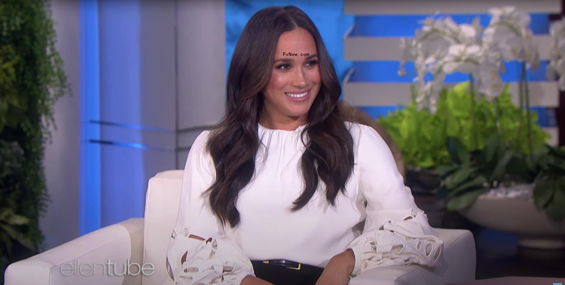 Meghan Markle in a white outfit in an 