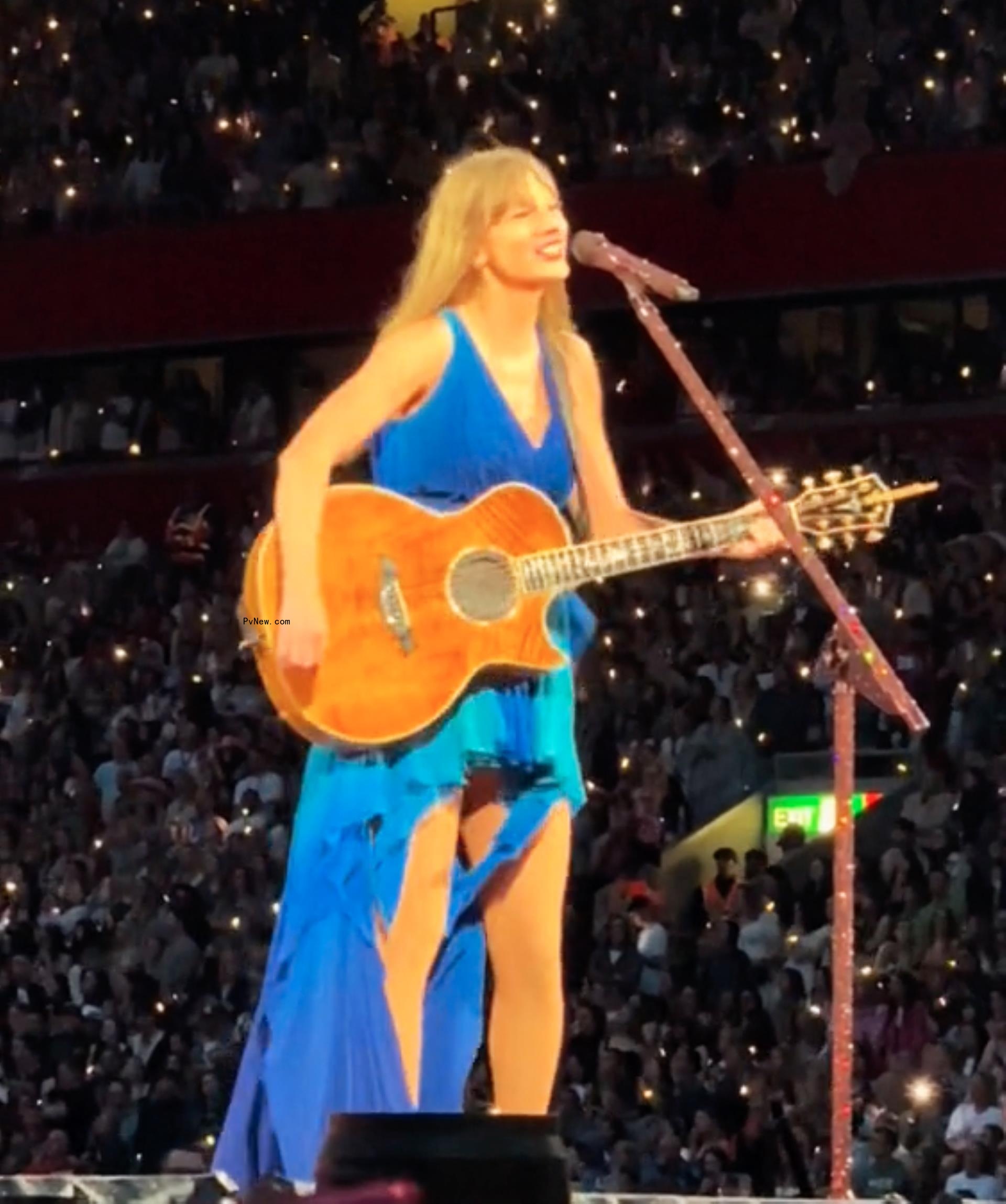 Taylor Swift performing at the Eras Tour