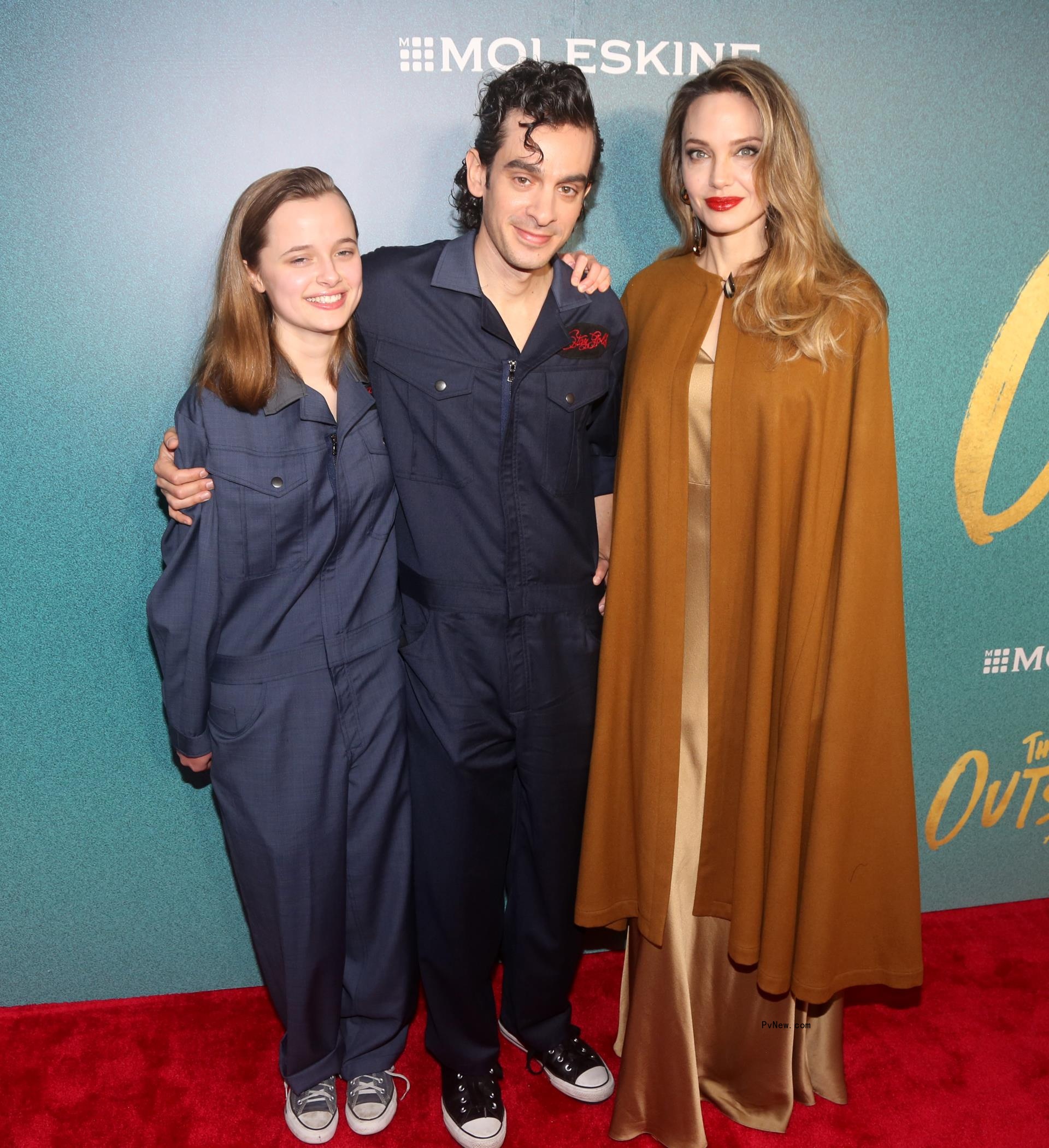Vivienne Jolie-Pitt and Angelina Jolie on a red carpet 