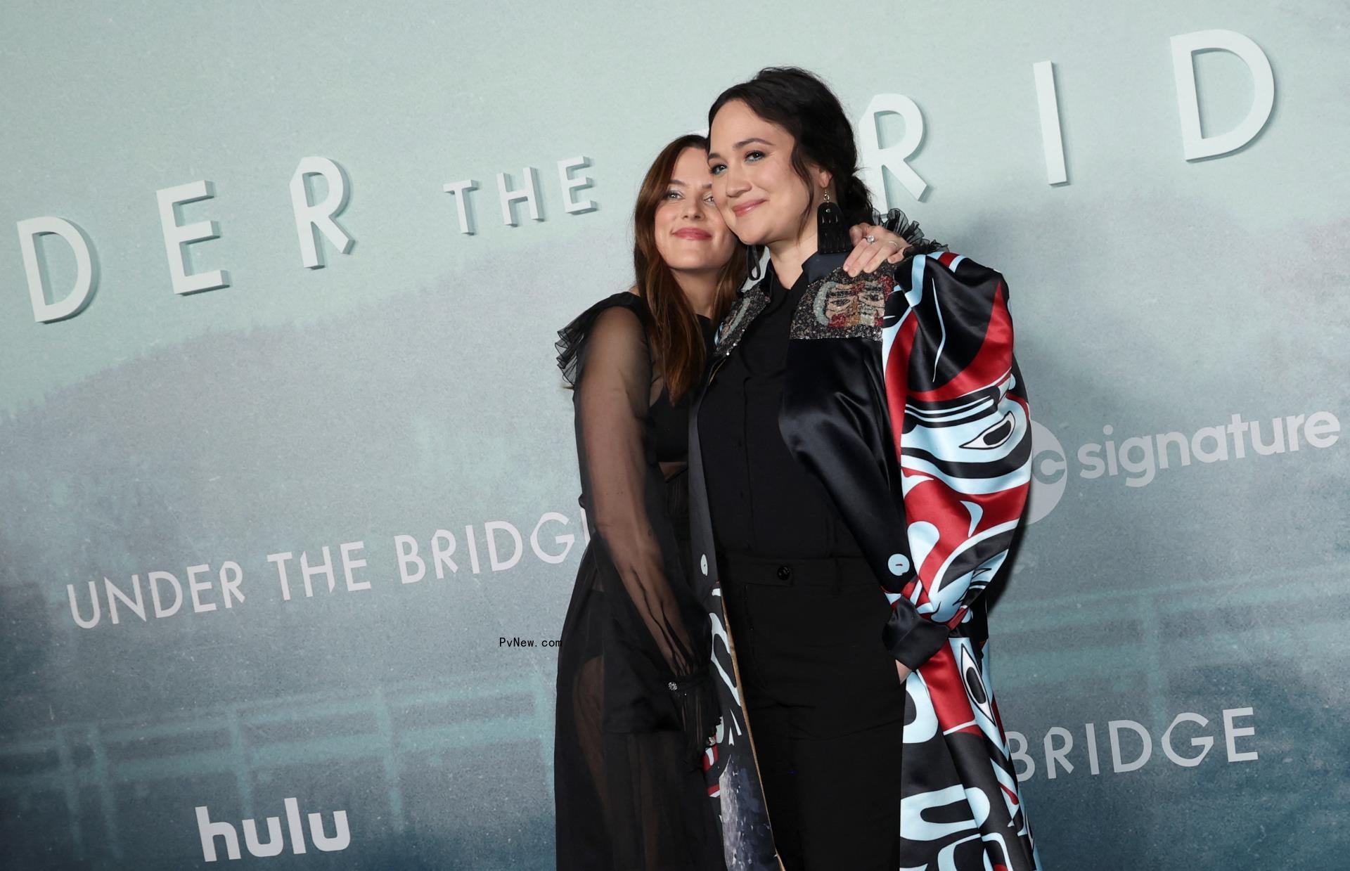 Riley Keough cuddles up to Lily Gladstone at the premiere of 