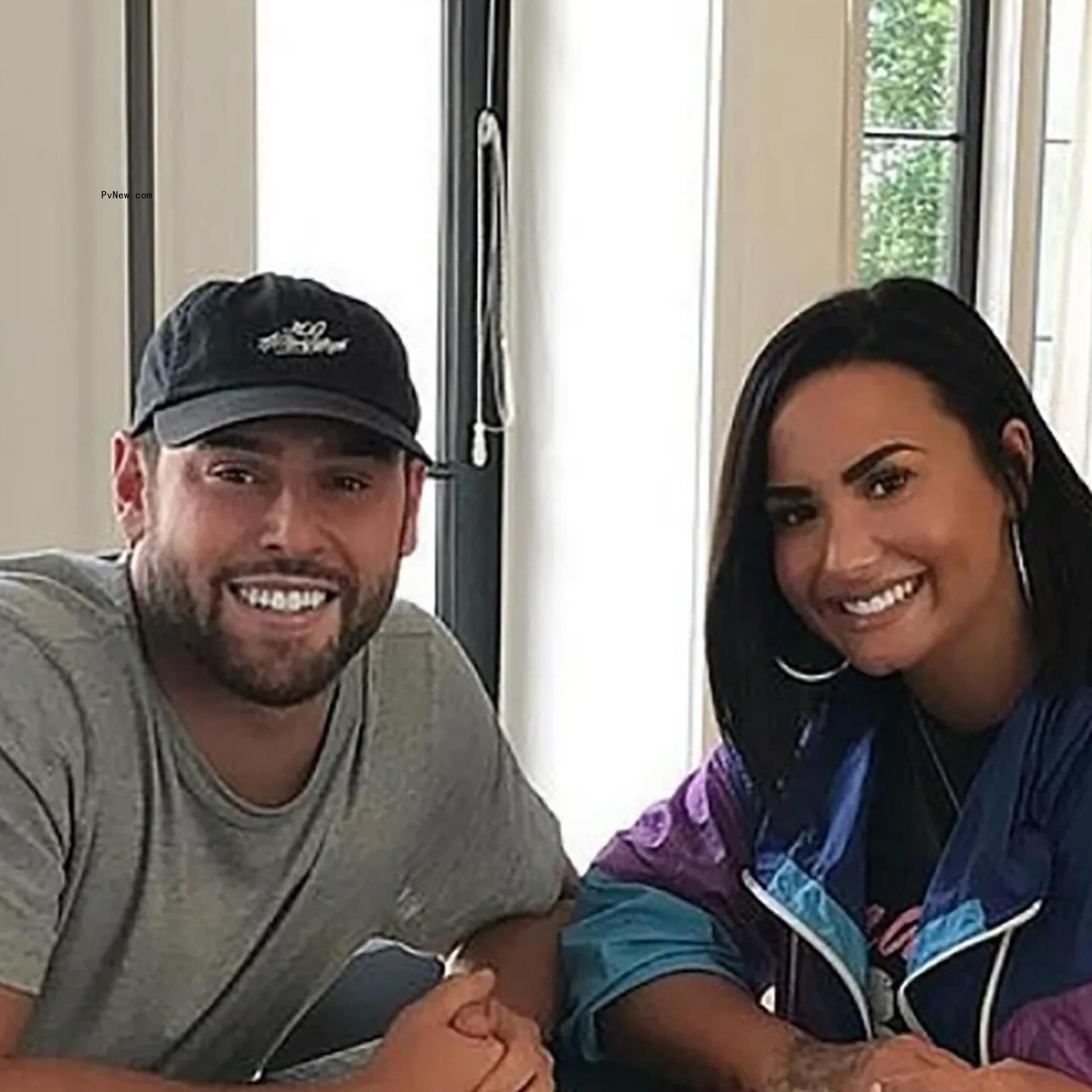 Scooter Braum and Demi Lovato. 