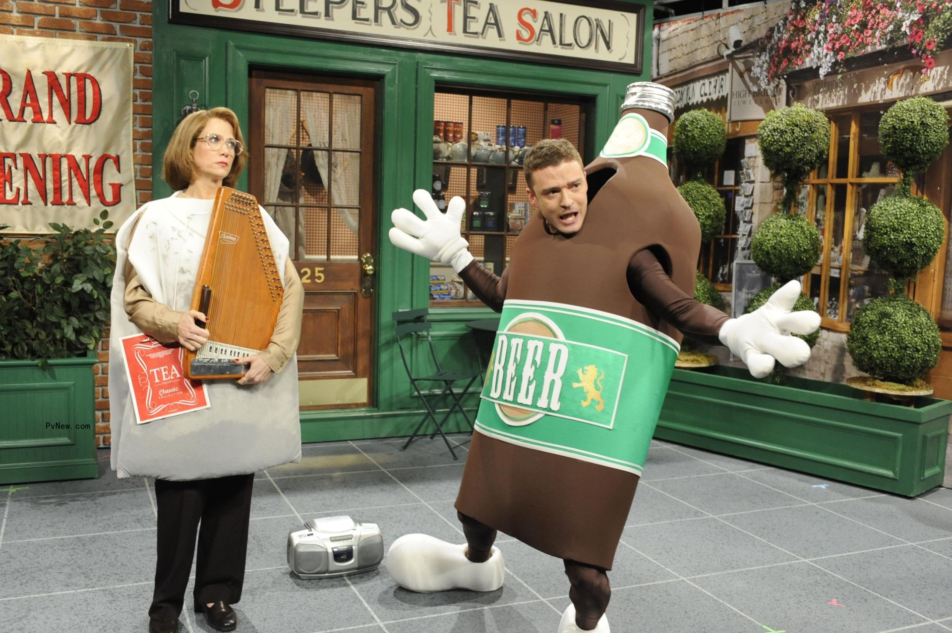 Justin Timberlake wearing a beer bottle costume.