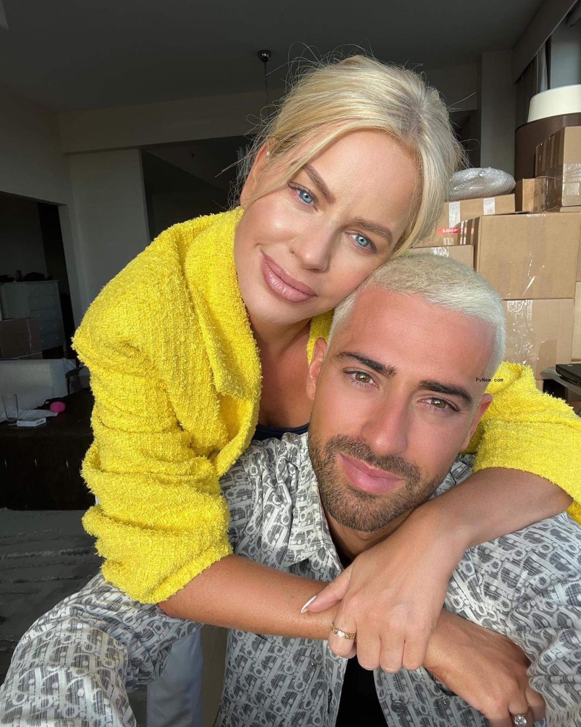 Caroline Stanbury hugging Sergio Carrallo