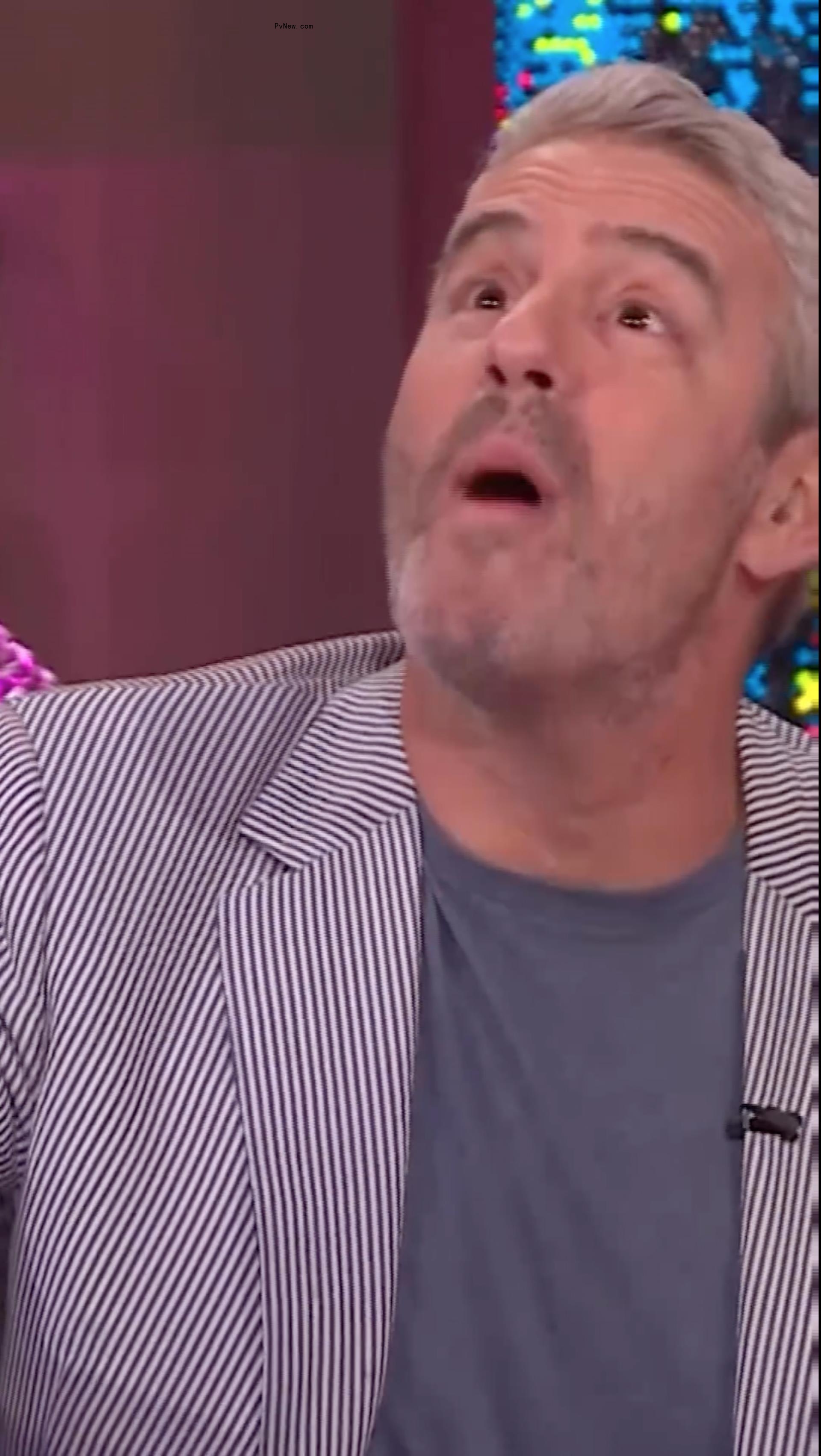Andy Cohen being hit with a bottle on 