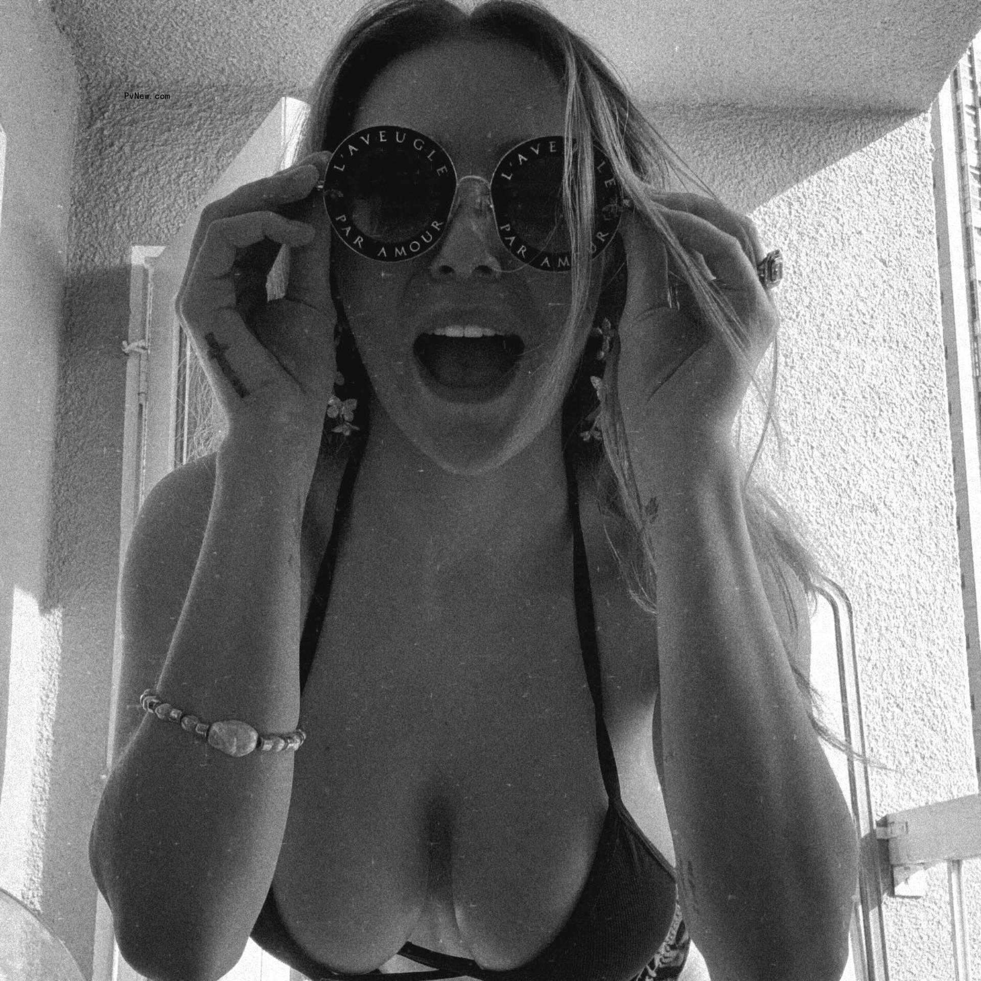 Courtney Stodden smiling into a mirror