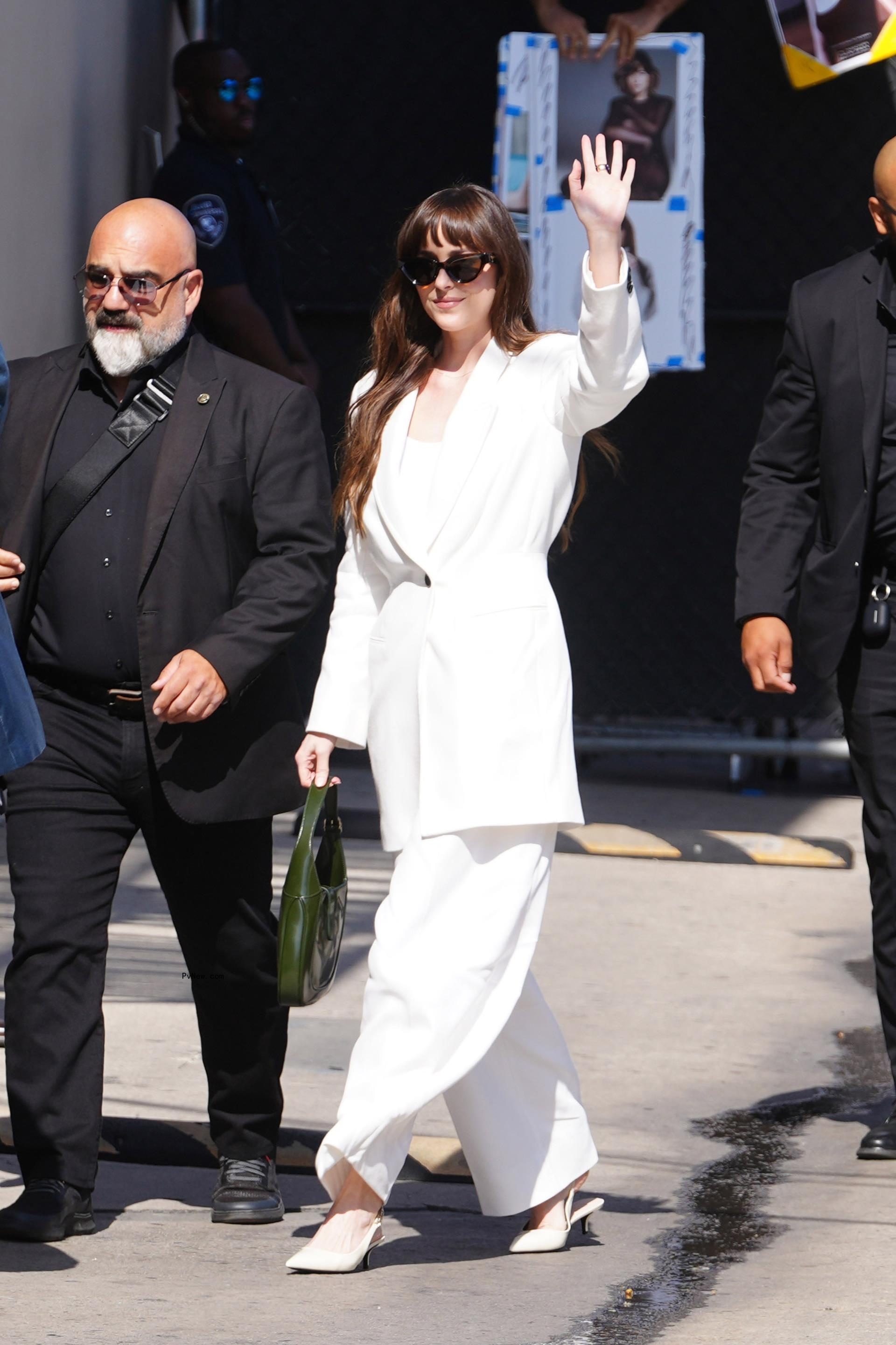 Dakota Johnson’s dress falls off during ‘Jimmy Kimmel Live’ wardrobe malfunction