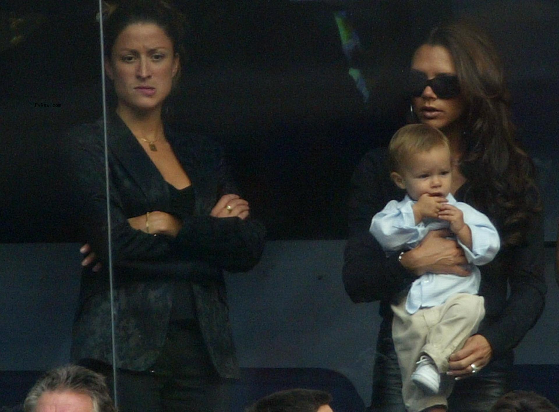 Rebecca Loos and Victoria Beckham, holding baby Romeo Beckham