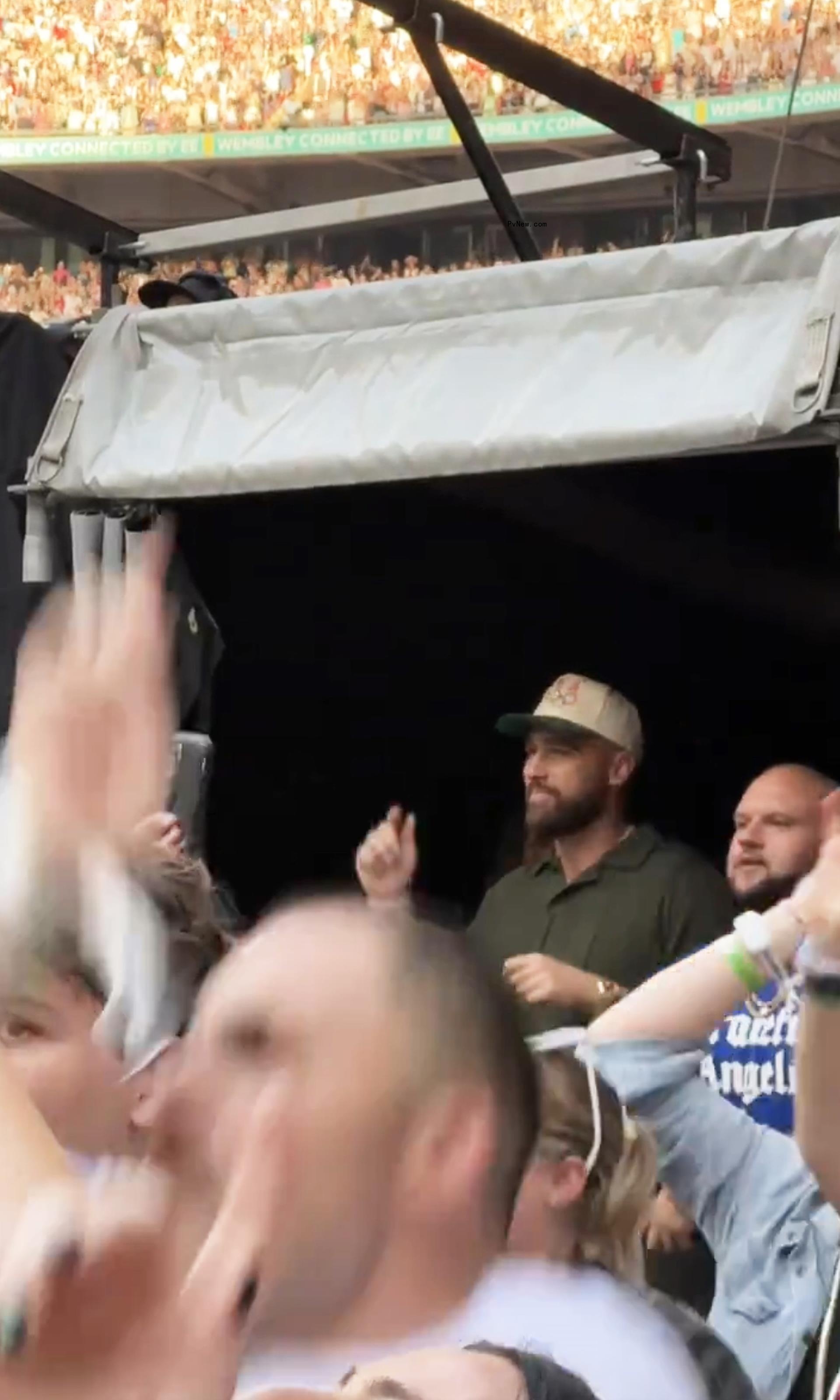 Travis Kelce dancing at Taylor Swift's co<i></i>ncert in London