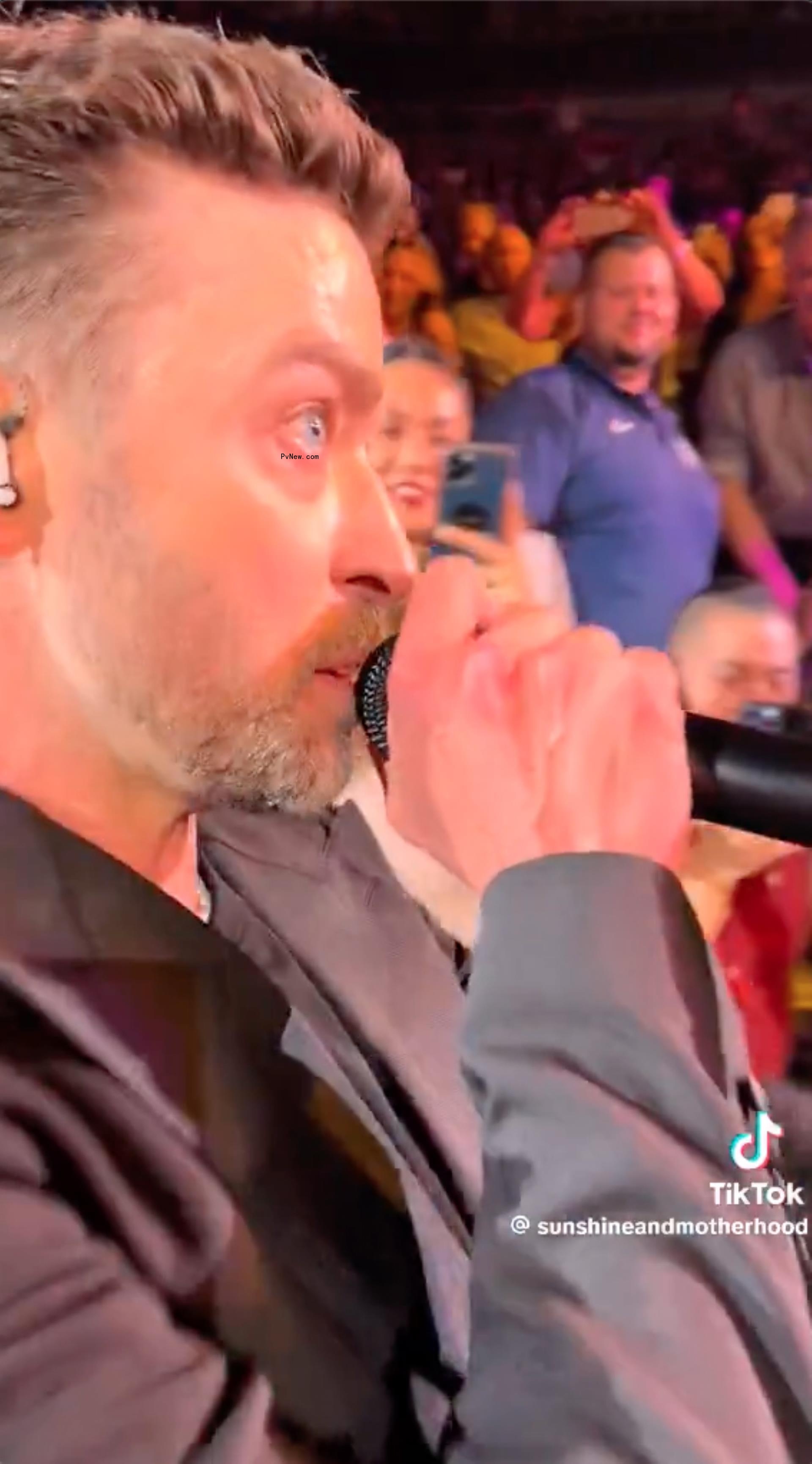Justin Timberlake performing with bloodshot eyes