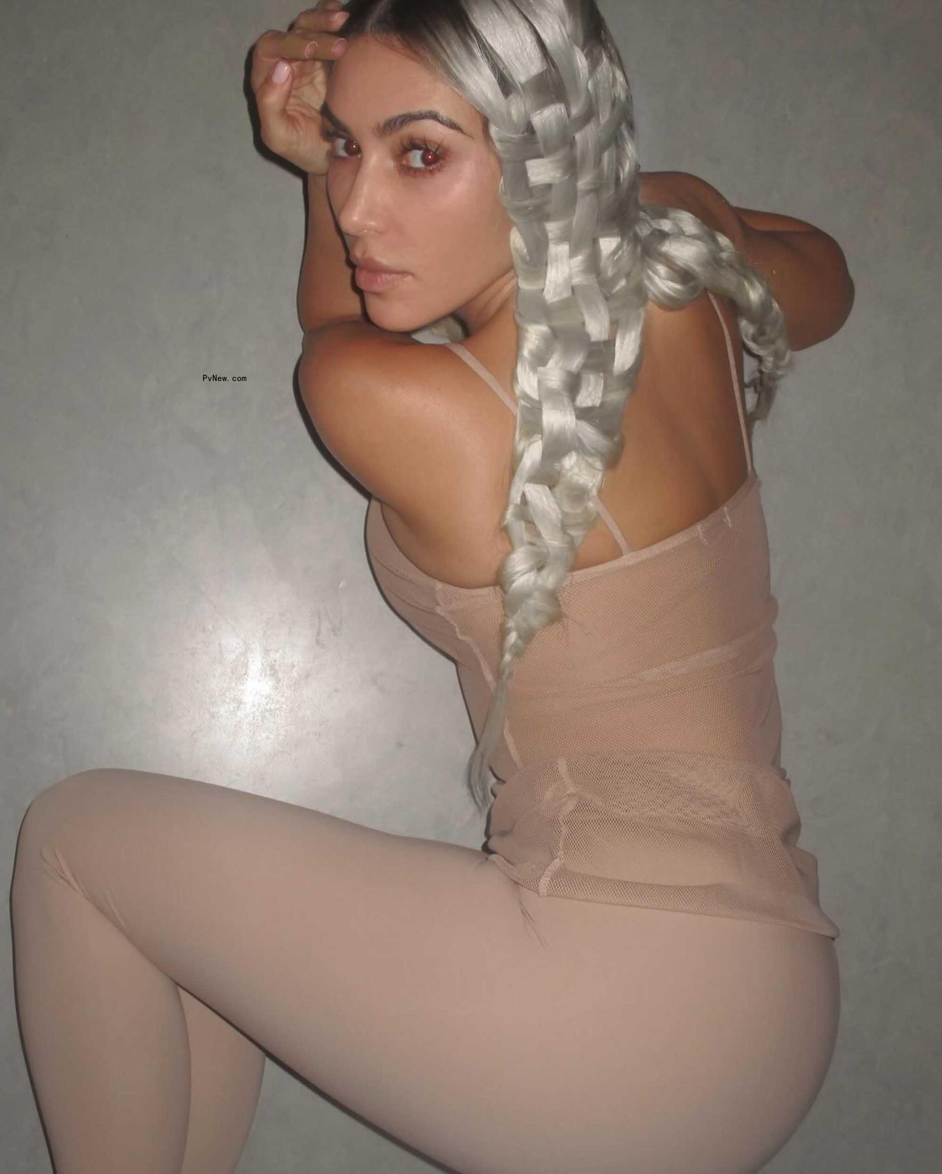 Kim Kardashian wearing a woven hairdo. 