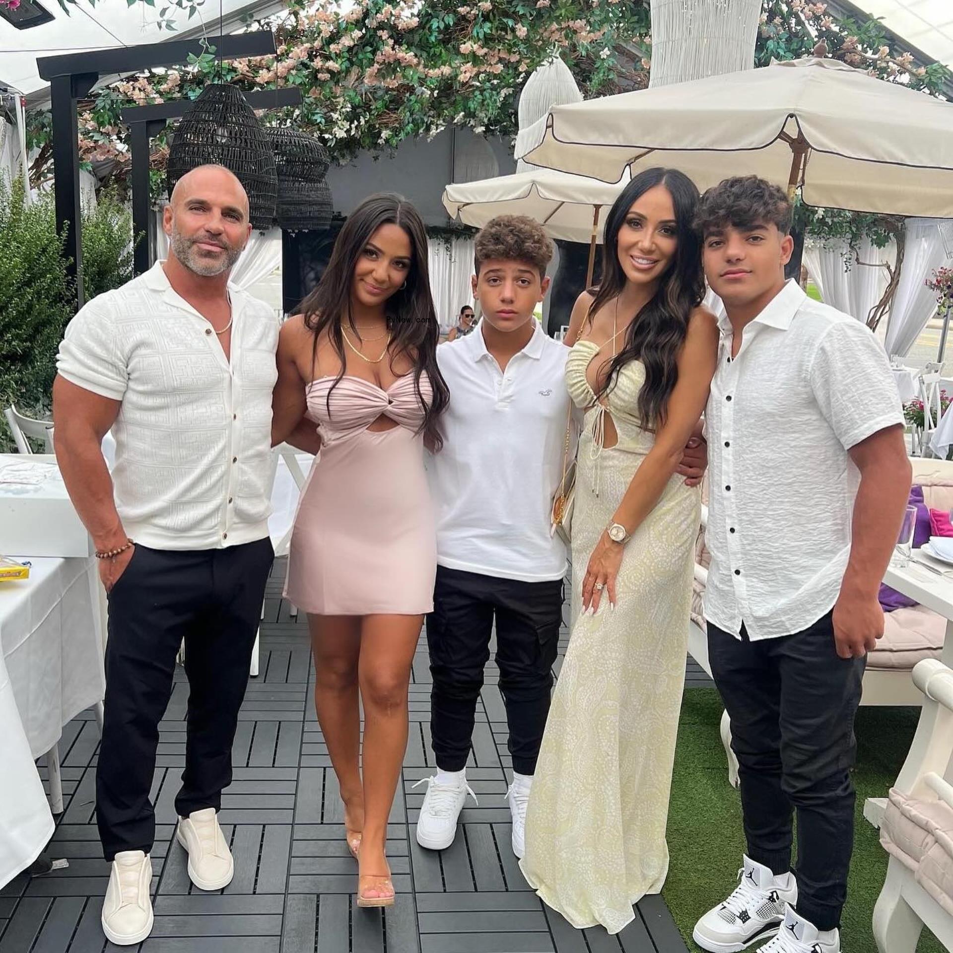 Melissa Gorga and Joe Gorga posing with their kids