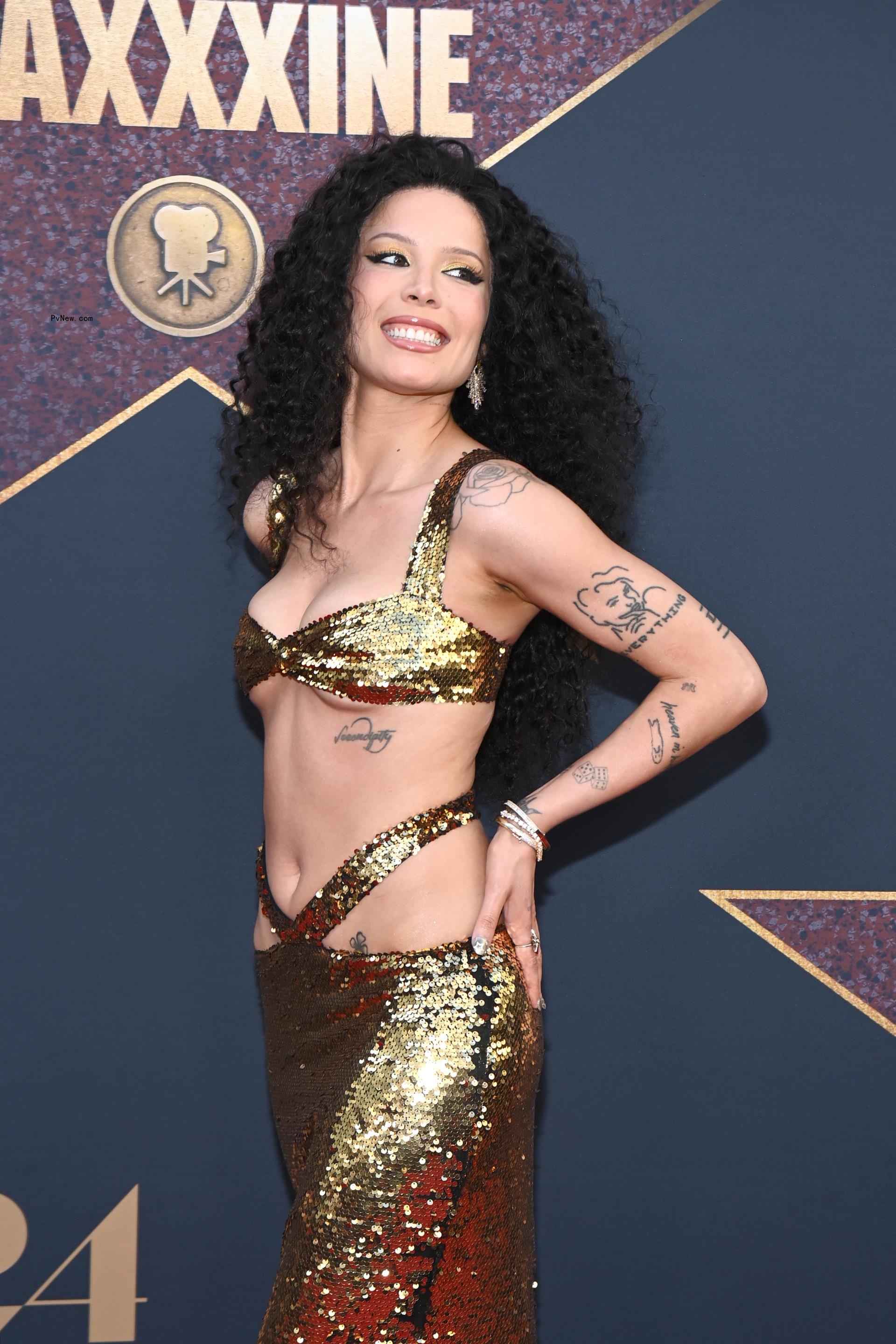 Halsey wears a gold dress to the 
