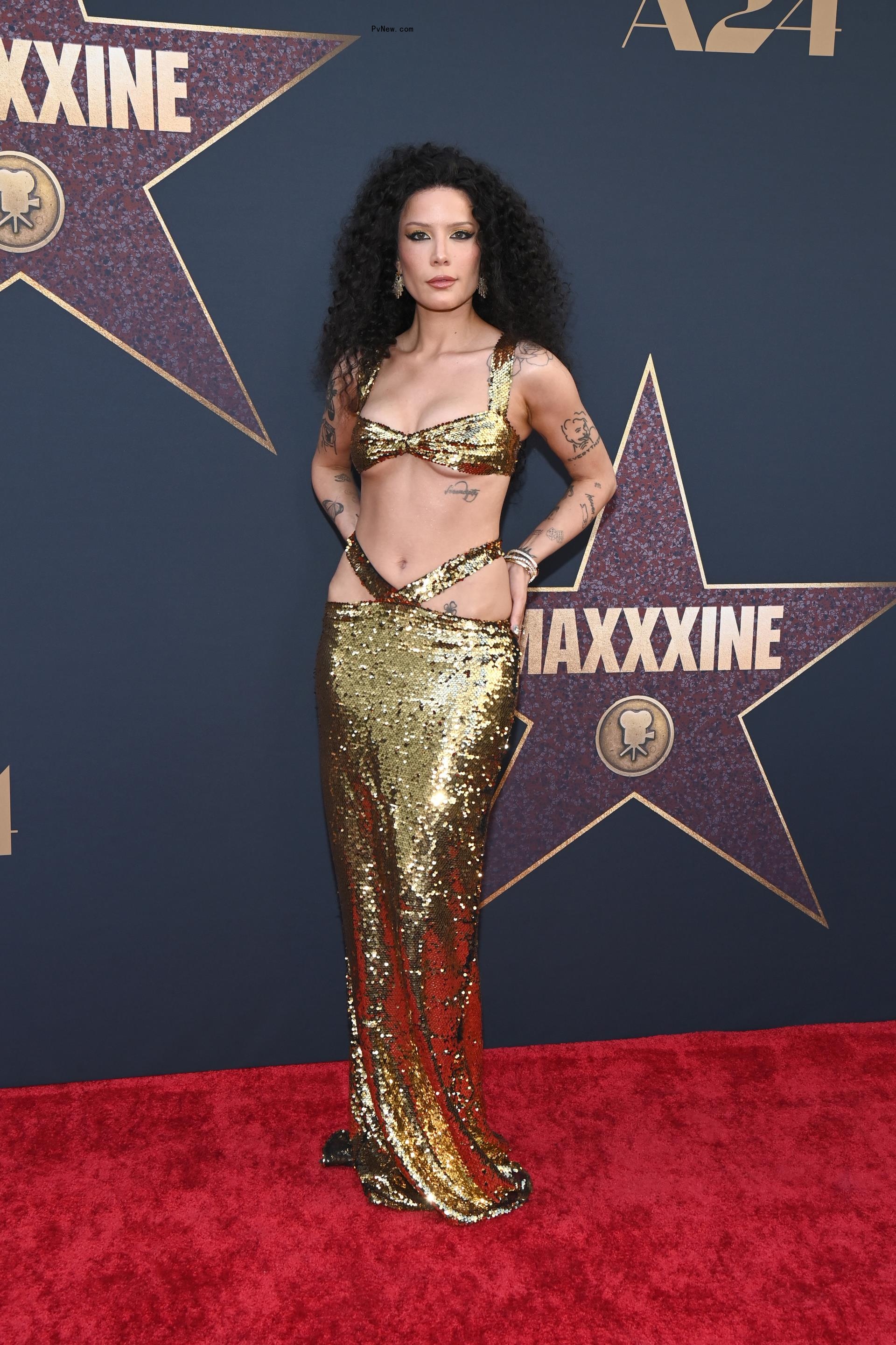 Halsey wears a gold dress to the 