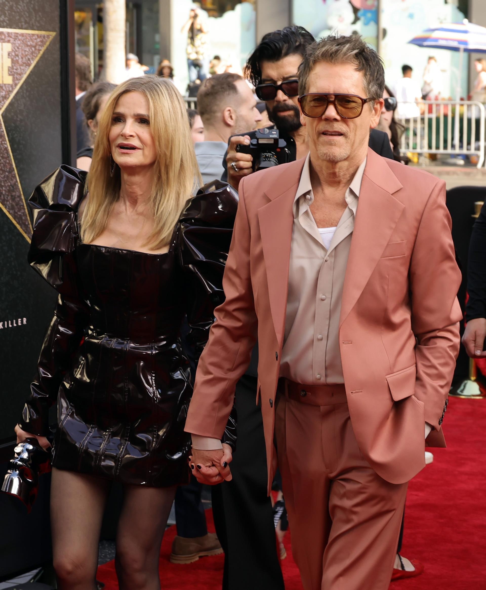 Kyra Sedgwick and Kevin Bacon posing together