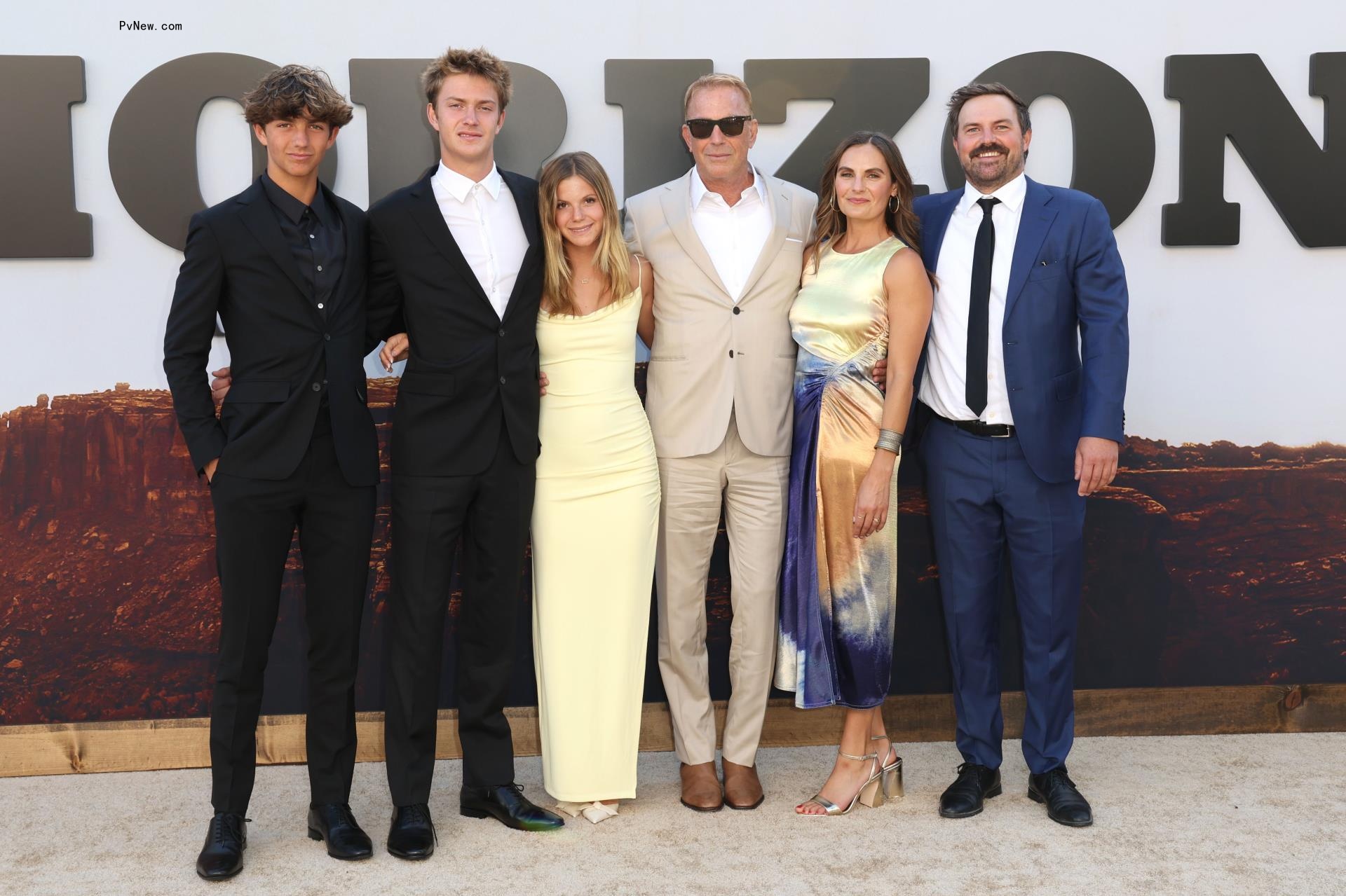 Hayes Costner, Cayden Wyatt Costner, Grace Costner, Kevin Costner, Annie Costner and Joe Costner posing for a photo 