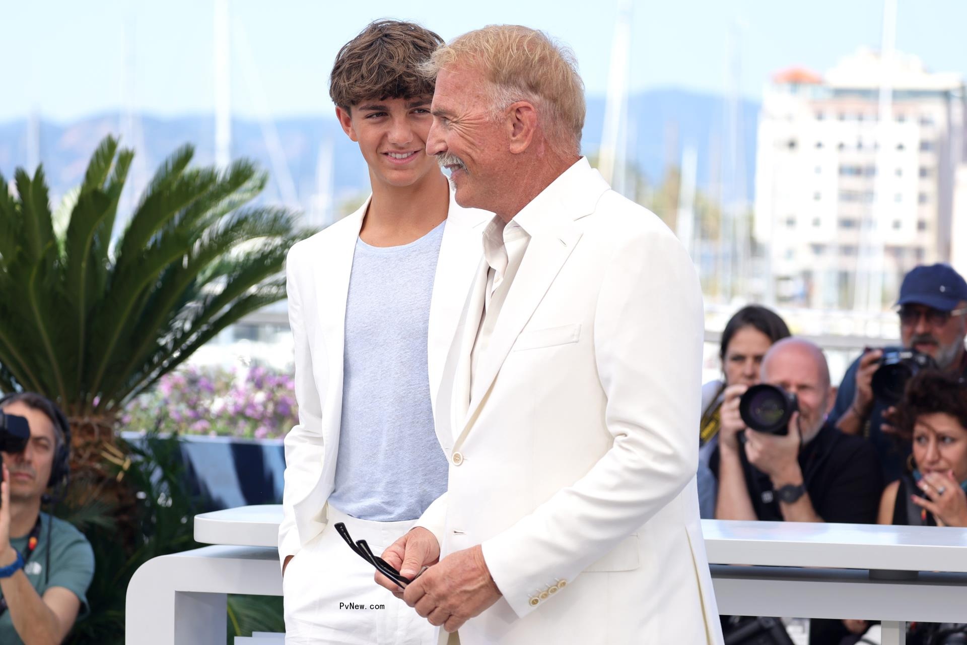 Hayes Costner and Kevin Costner walking together