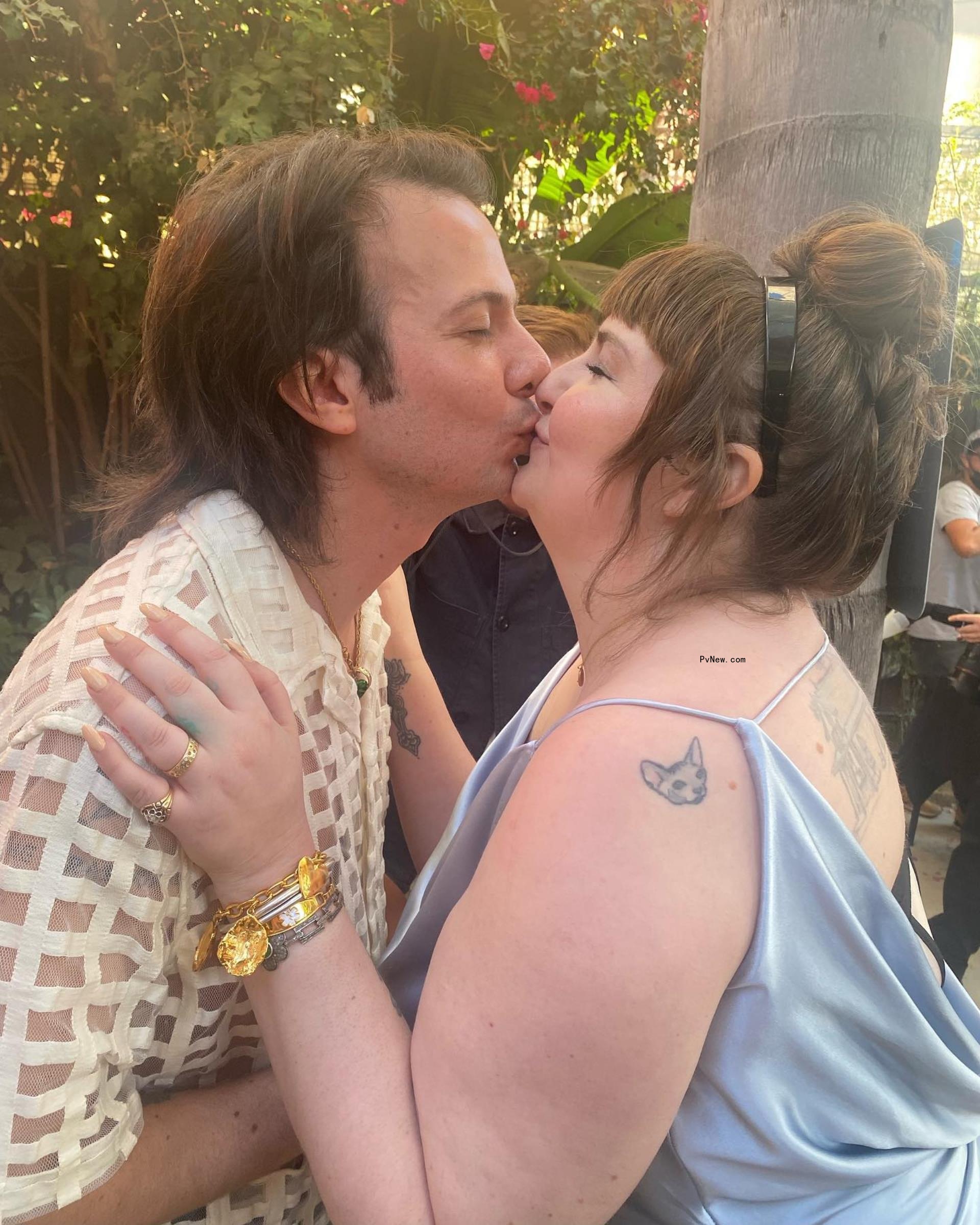 Lena Dunham kissing husband Luis Felber
