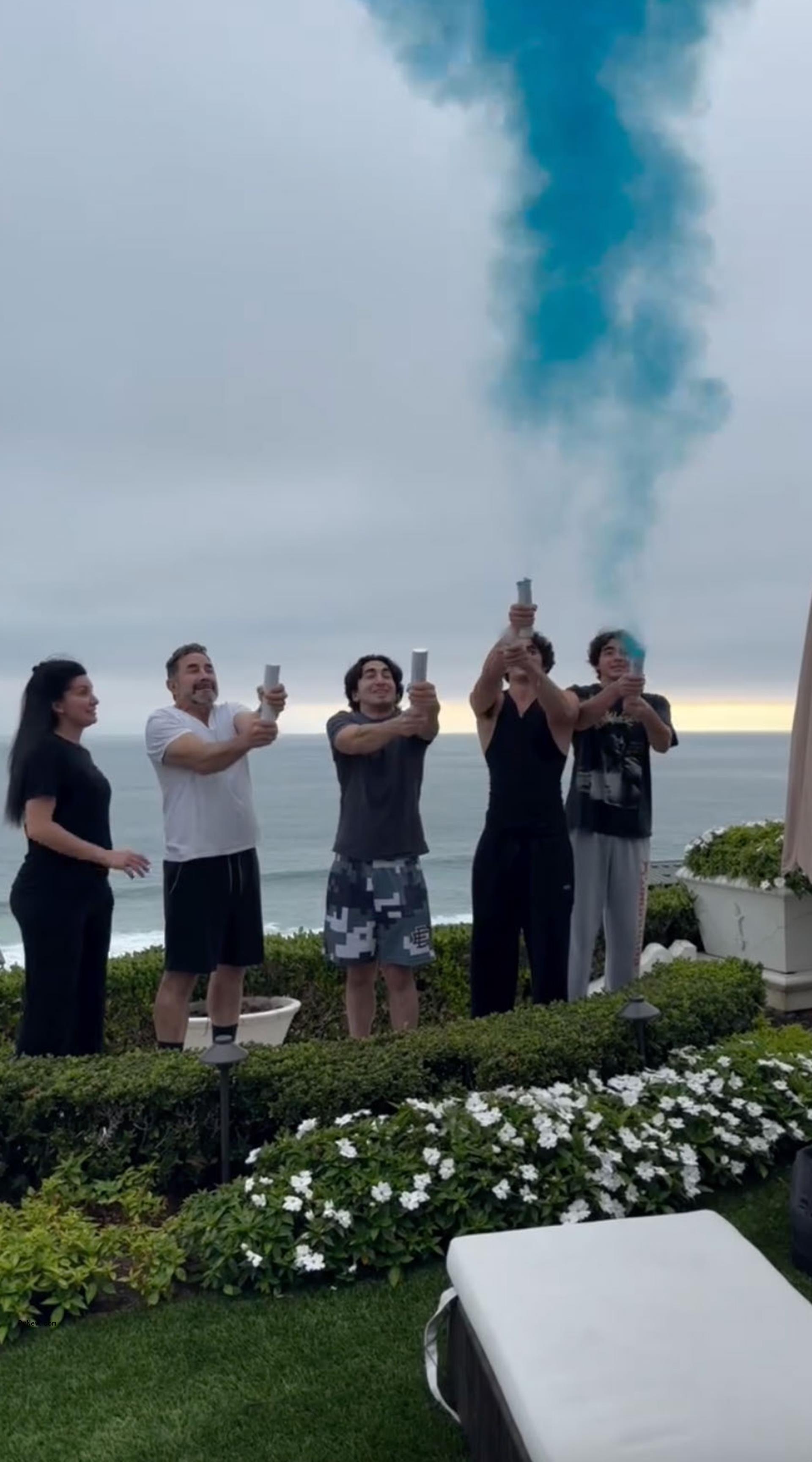 paul nassif, wife brittany pattakos and his sons shooting off blue smoke cannons