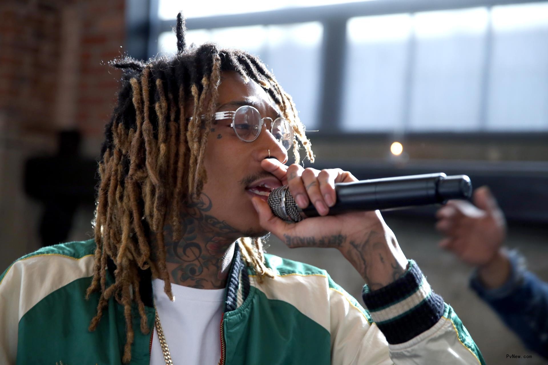 Wiz Khalifa performing.