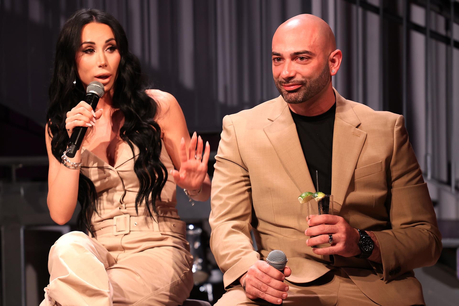 Rachel Fuda and John Fuda speaking