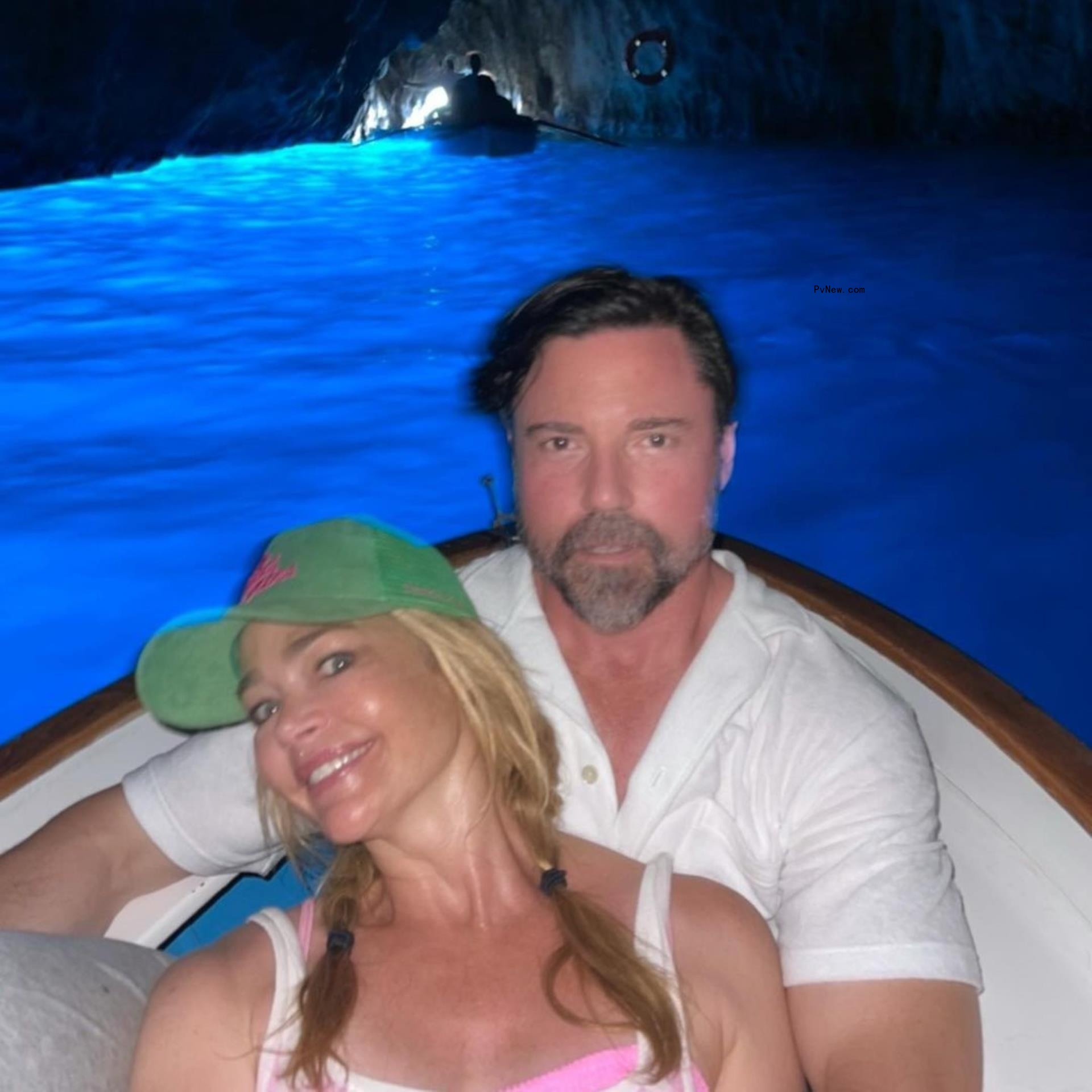 Denise Richards and Aaron Phypers in a boat. 