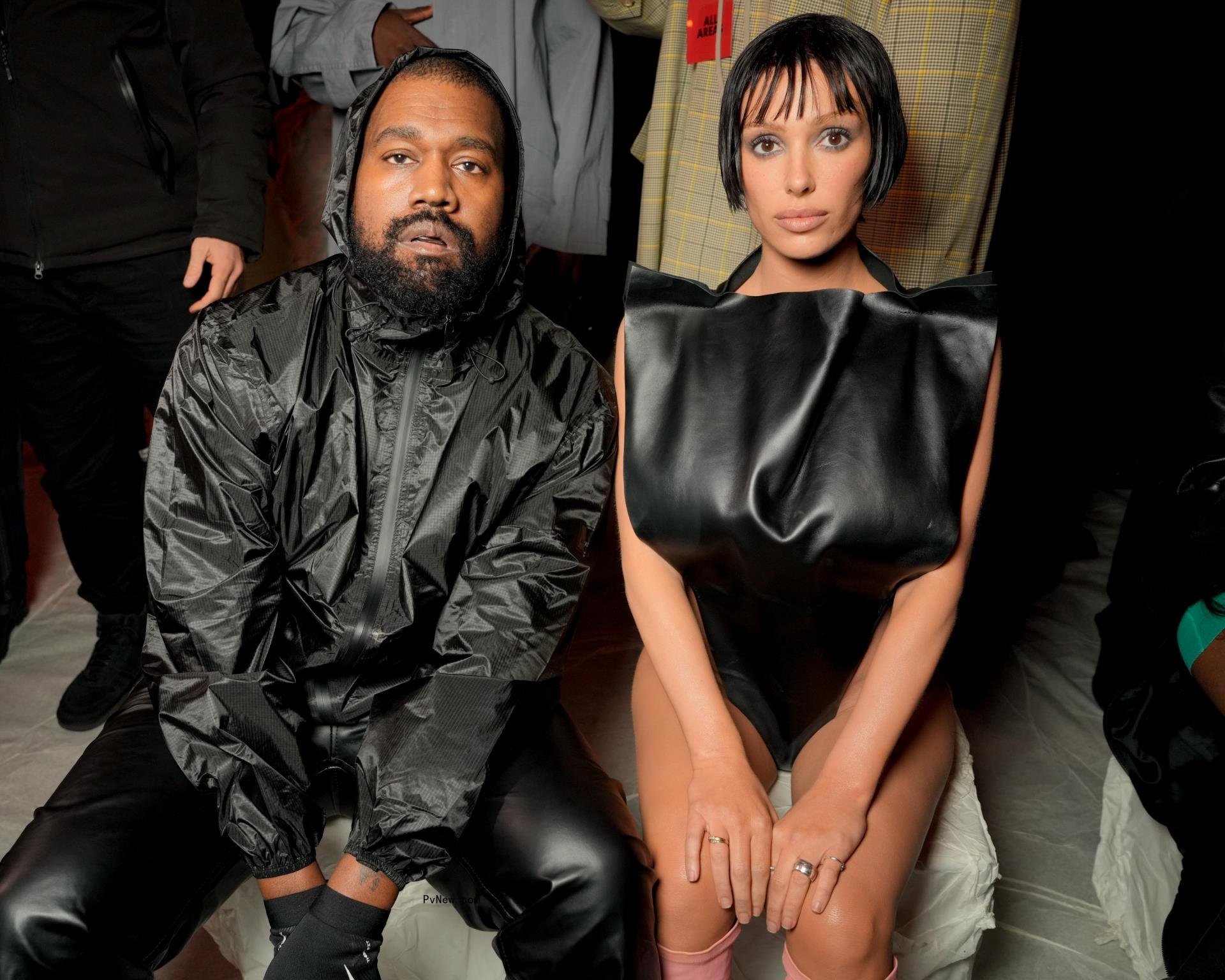 Bianca Censori and Kanye West at the Marni 2024 Fall Fashion Week show in Milan.