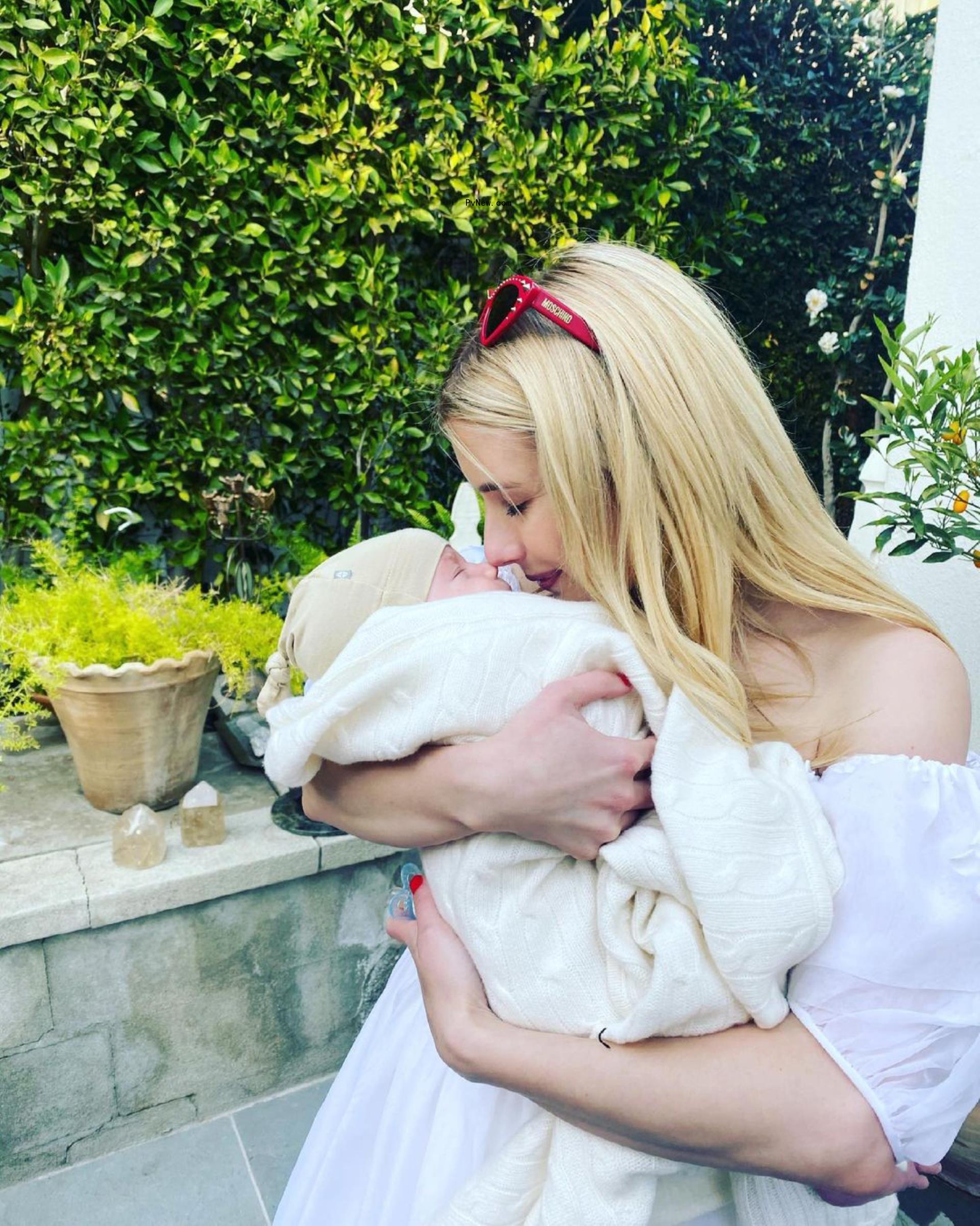 Emma Roberts and Cody John