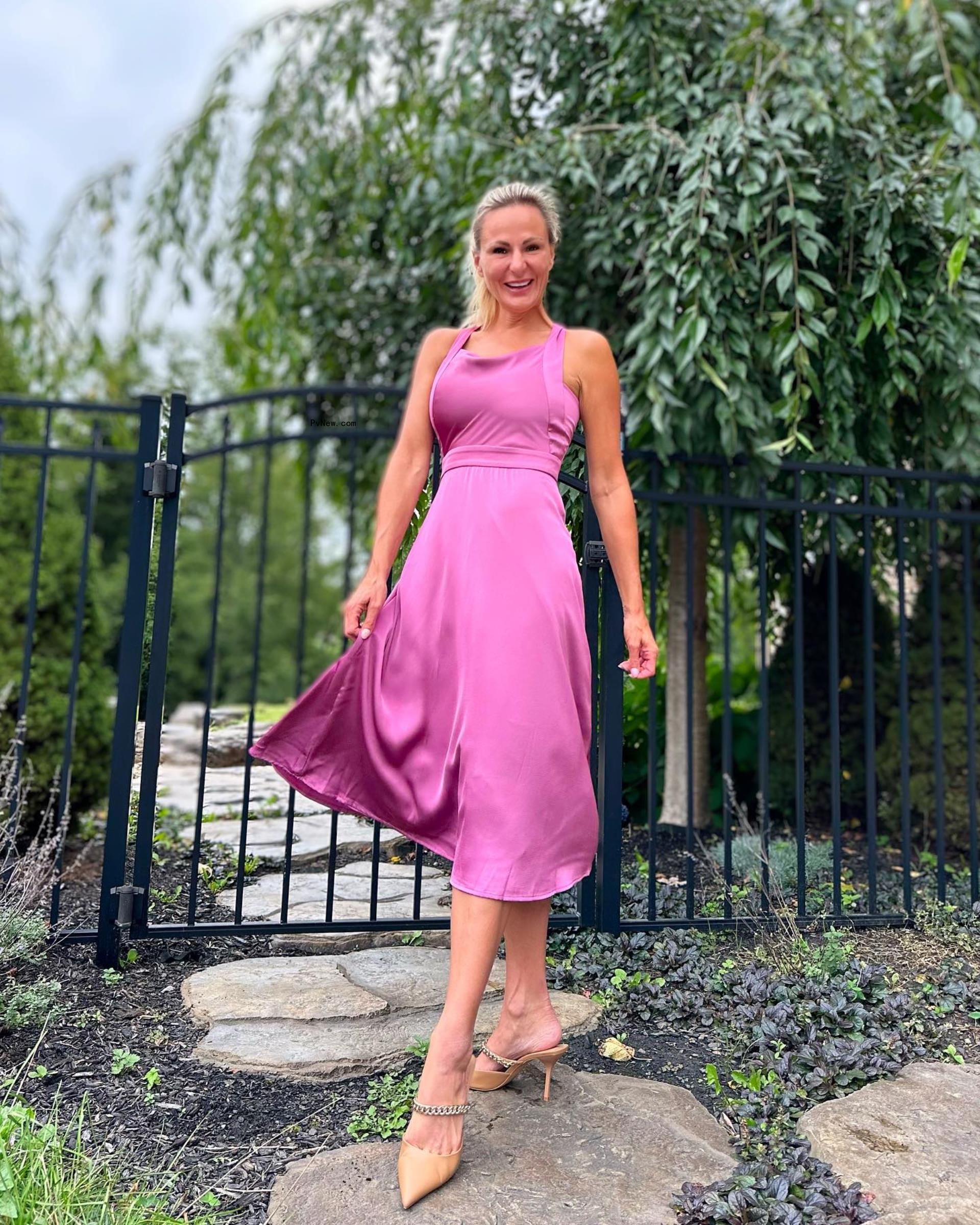 Christi Lukasiak in a pink dress. 