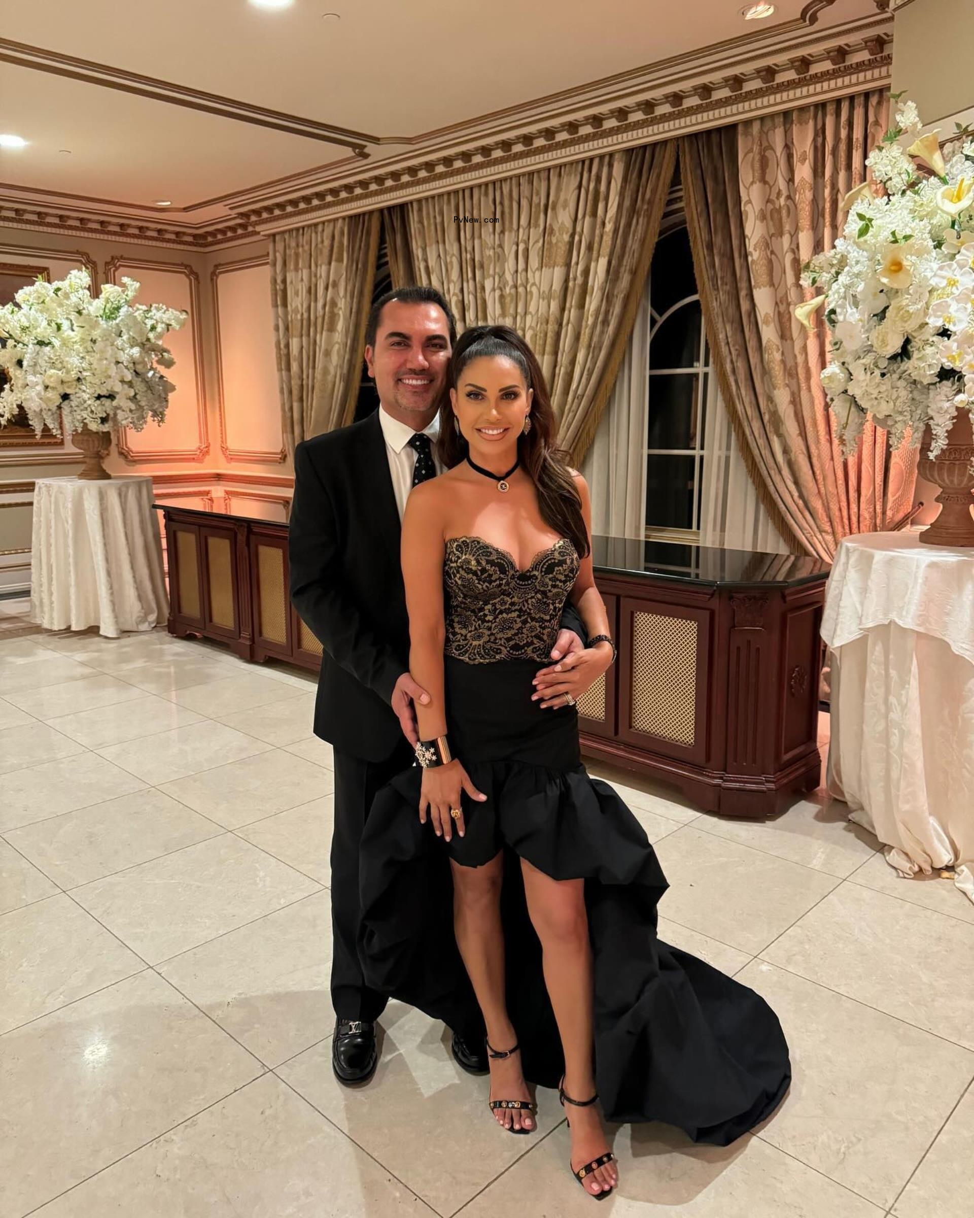 Bill Aydin and Jennifer Aydin posing together