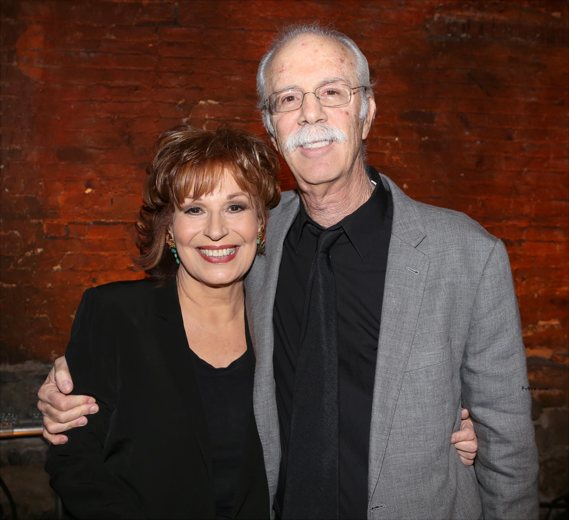 Joy Behar and husband Steve Janowitz posing for a photo
