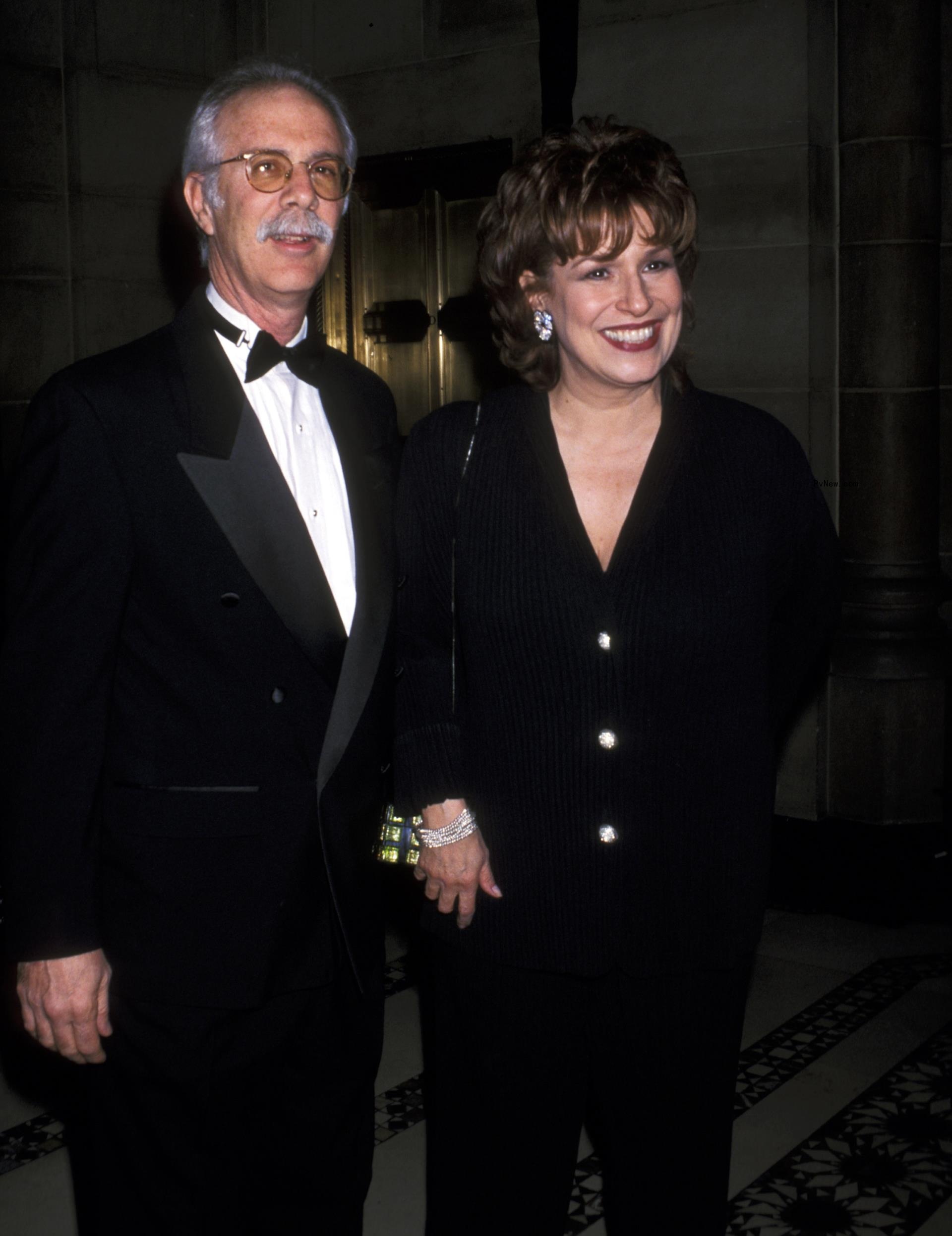 Joy Behar and Steve Janowitz posing for a photo