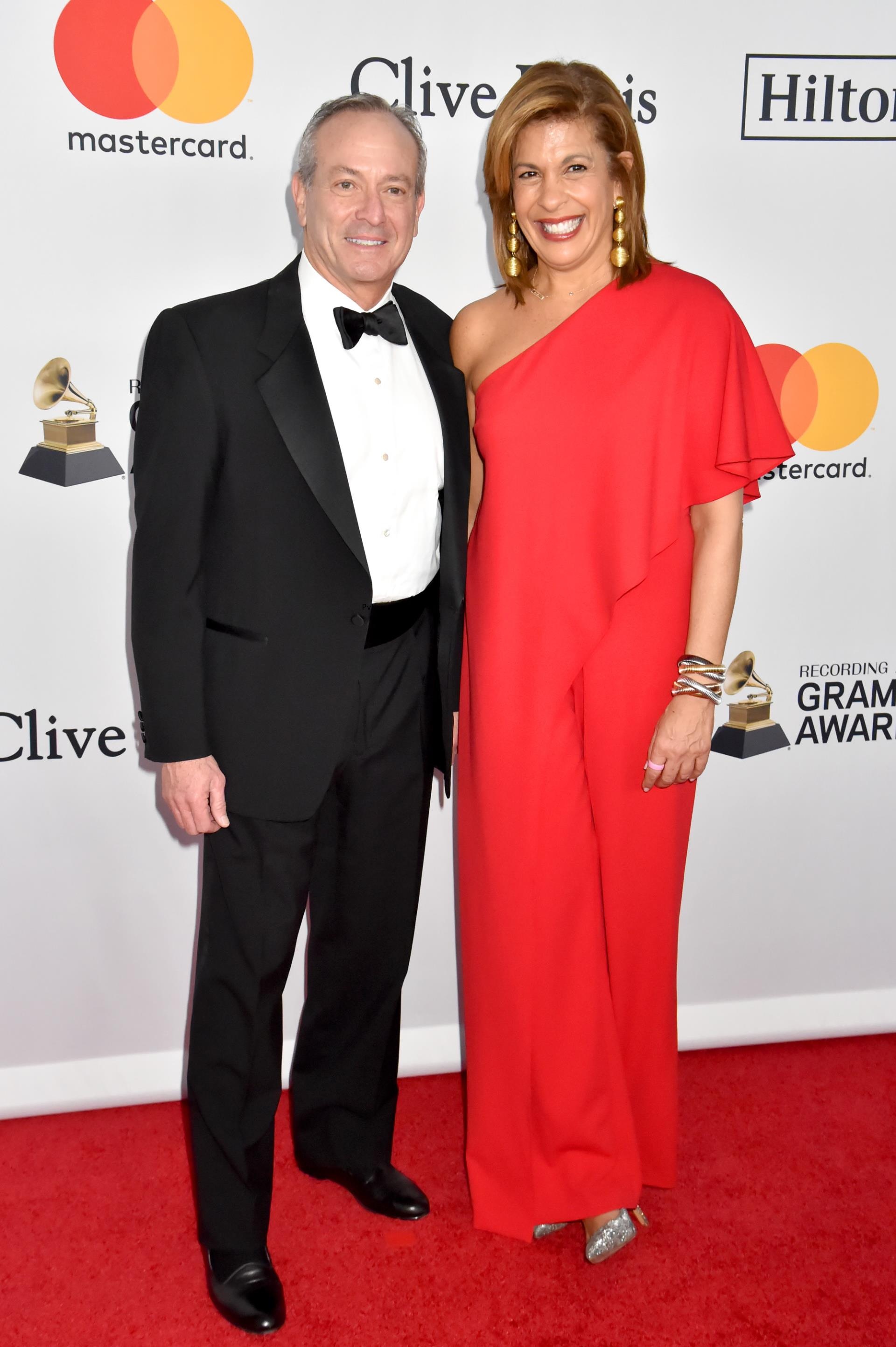 Financier Joel Schiffman (L) and journalist Hoda Kotb