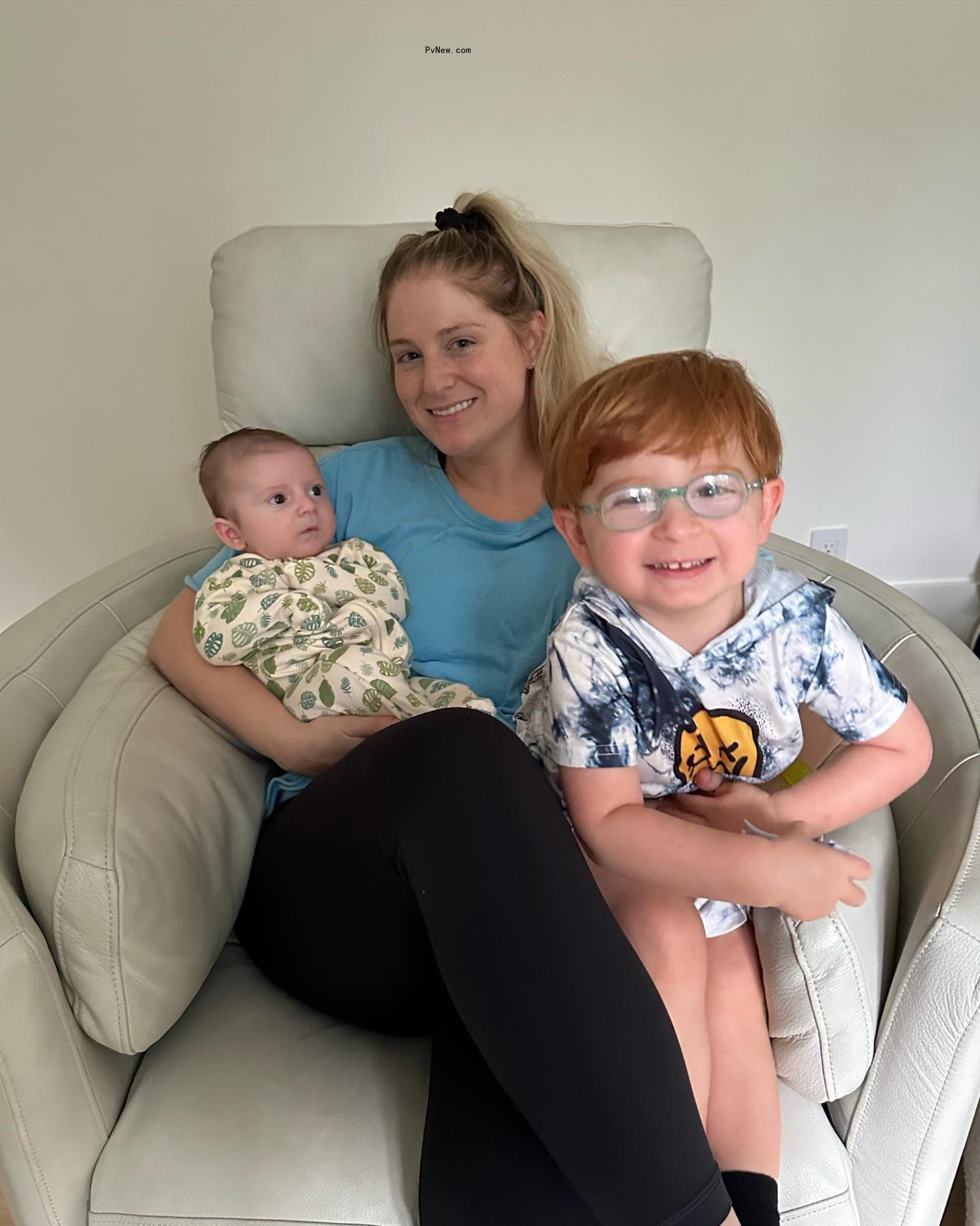 Meghan Trainor holding her sons.